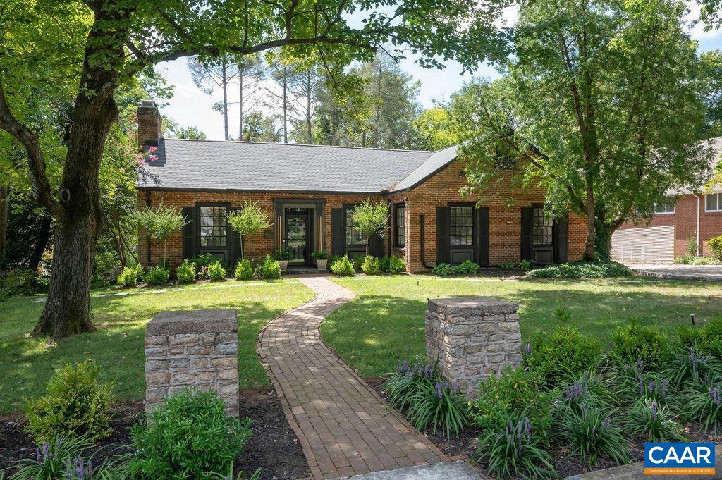 Undeniably the BEST LOT AND LOCATION near UVA! Absolutely stunning .39 acre lot overlooking the UVA Dell pond, gardens & Contemplative Sciences Center & Commons. In 2025, an extensive renovation & complete redesign transformed the property into a luxurious 5-bedroom, 4-bath single-family residence. Gorgeous new kitchen features white shaker cabinets, quartz counters, new hardwood floors, stainless appliances & modern plumbing & light fixtures. New HVAC, extensive plumbing and electrical upgrades, fresh paint & newly tiled lower level & bathrooms. Masterful landscape design features 3 distinct terraces ideal for entertaining & recreation. The magical setting includes stone walls, tiered gardens, thousands of new plantings & a 300 sq. ft. pergola w/ raised deck & custom wood-burning fireplace. Enjoy the private bocce court framed by panoramic views of the Lambeth Arch, Dell Pond, and the Commons ? all just steps from the heart of UVA.,Painted Cabinets,Quartz Counter,White Cabinets,Wood Cabinets,Fireplace in Family Room,Fireplace in Living Room