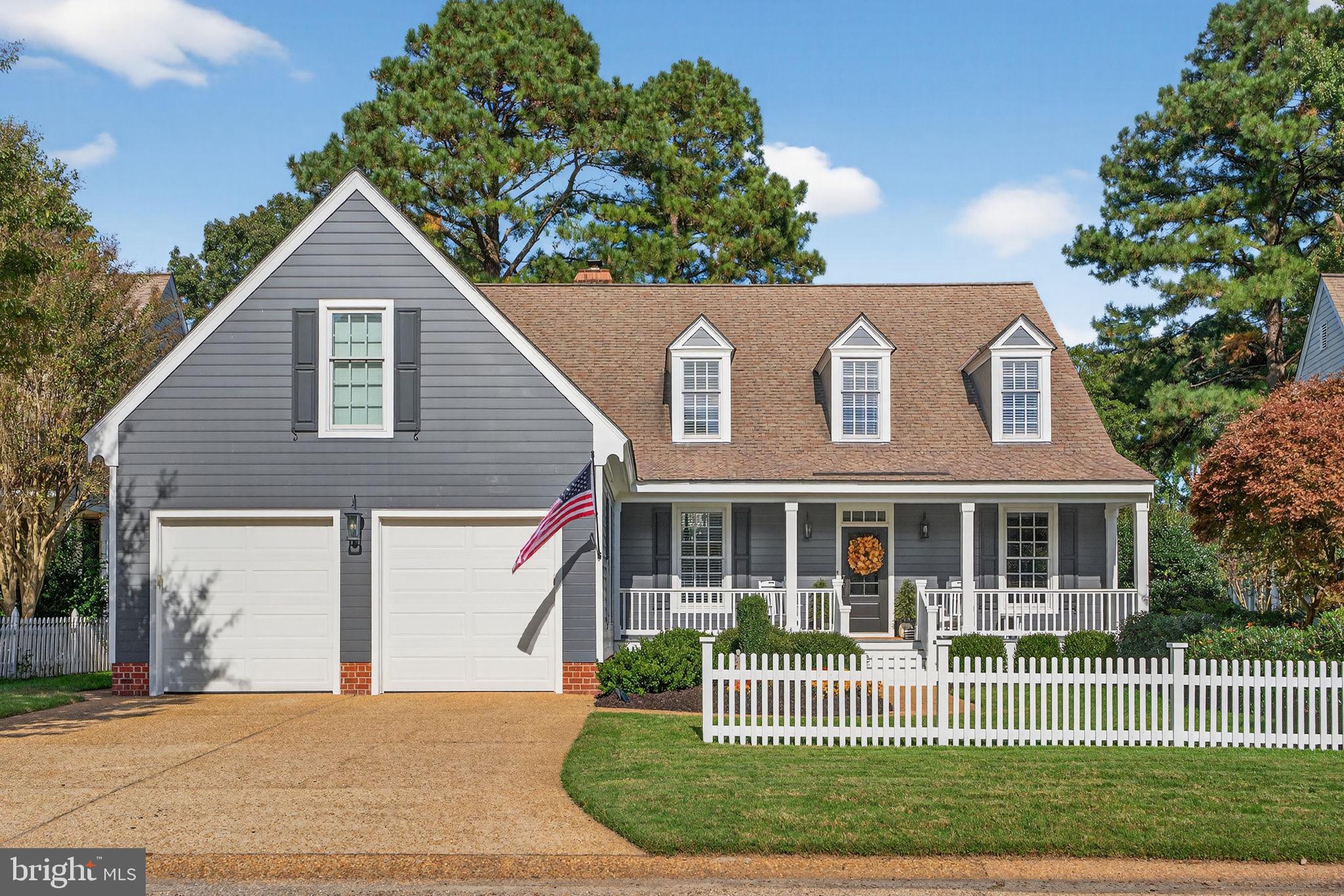 Experience the epitome of designer luxury at 164 Highland. Nestled on the 18th fairway of the exclusive Marsh Hawk course in the St. Andrews section of Ford's Colony, Williamsburg's Premier Golf Community. This stunning home offers total first-floor living with panoramic golf course views and sophisticated custom finishes throughout. An award winning kitchen features a 48" range, built-in refrigerator, farm sink, glittering fixtures and beautiful Cambria counter tops. A stunning marble fireplace surround and custom cabinetry frame the gracious living room. The first-floor primary suite is a private retreat, offering a stunning soaking tub, oversized shower and two amazing closets. Relax and entertain in your keeping room near the front entrance, the new all-season back porch or the patio with a full outdoor kitchen and firepit! Upstairs includes a second primary with ensuite bath, two additional bedrooms, another full bath, an office, and a bonus room. All just minutes from the charm, history, fine dining and entertainment that make Williamsburg one of Virginia's most coveted places to call home.