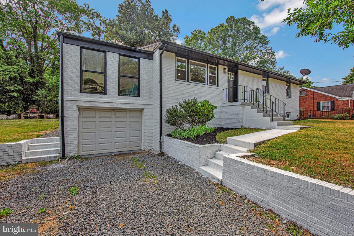 Stunning fully renovated single-family home in District Heights — updated from top to bottom with premium finishes throughout. Brand-new roof, windows, HVAC, and water heater provide years of worry-free living. Gorgeous new flooring flows throughout the entire home, complemented by fresh paint and designer fixtures. The fully remodeled kitchen features brand-new stainless steel appliances and new cabinetry. Spa-inspired bathrooms have been completely gutted and rebuilt with new tile, vanities, and fixtures. Fresh landscaping enhances curb appeal from the moment you arrive. Every major system and surface has been replaced — this is truly move-in ready with nothing left to do but unpack. Prime location minutes to Washington DC via Pennsylvania Ave, with easy access to National Harbor, Six Flags America, Bladensburg Waterfront Park, Walker Mill Regional Park, Smithsonian Museums, Frederick Douglass NHS, and major employment corridors throughout DC, MD & VA. Don’t miss this one — turn-key homes at this price point go fast!