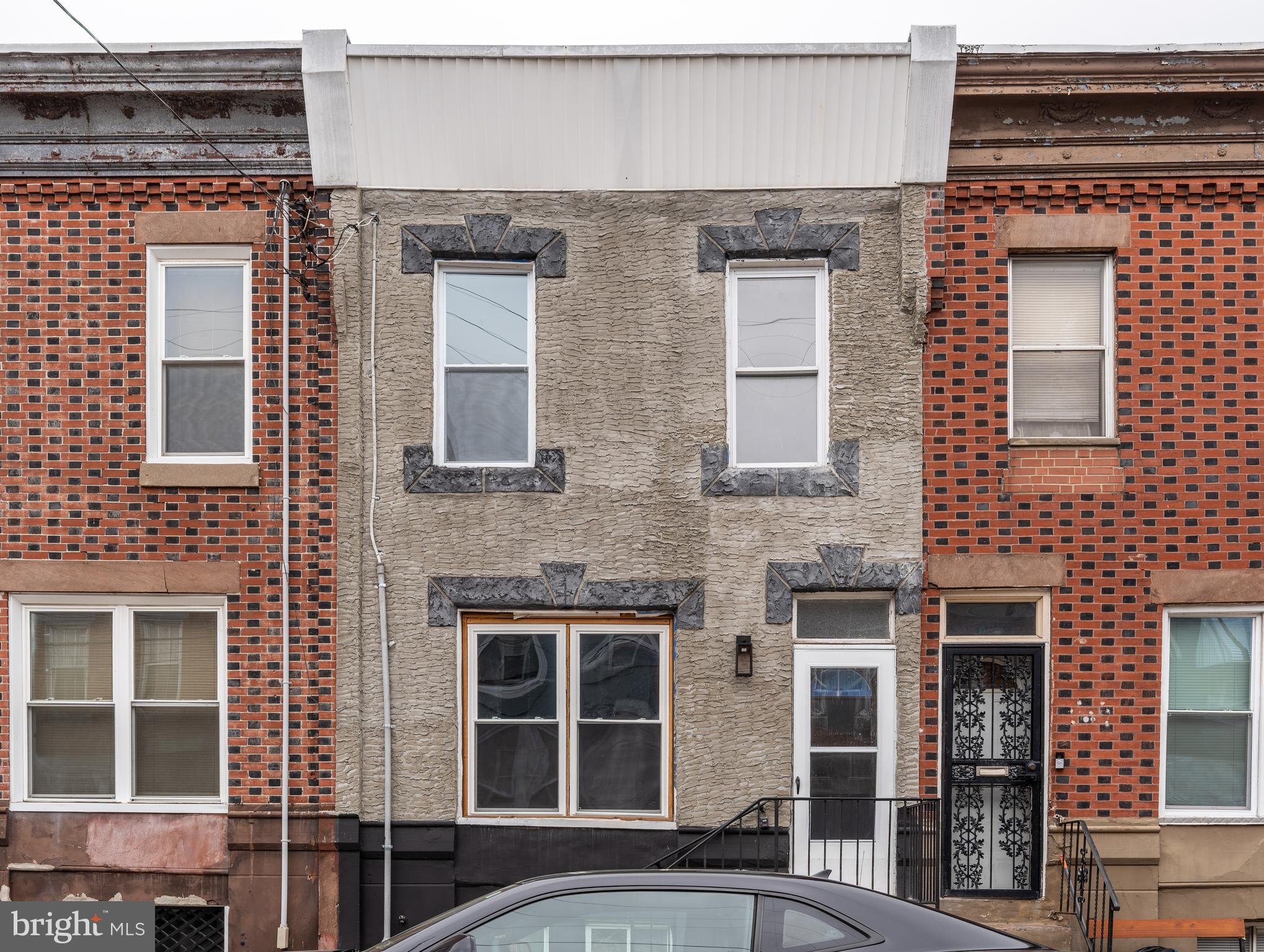 Welcome to 2323 Moore, located on the southern edge of the popular Point Breeze neighborhood in South Philadelphia. This home just underwent a full renovation! This three bedroom home was converted to a two bedroom to offer more bedroom square footage, expanded closet space, and a much larger hall bath. That said, this reimagined two bedroom, one and a half bath row will wow you. This is a complete renovation, freshly outfitted with a new systems, including HVAC, providing ice cold central air and the comfort of forced hot air heat in the winter. This home has been redone, top to bottom.