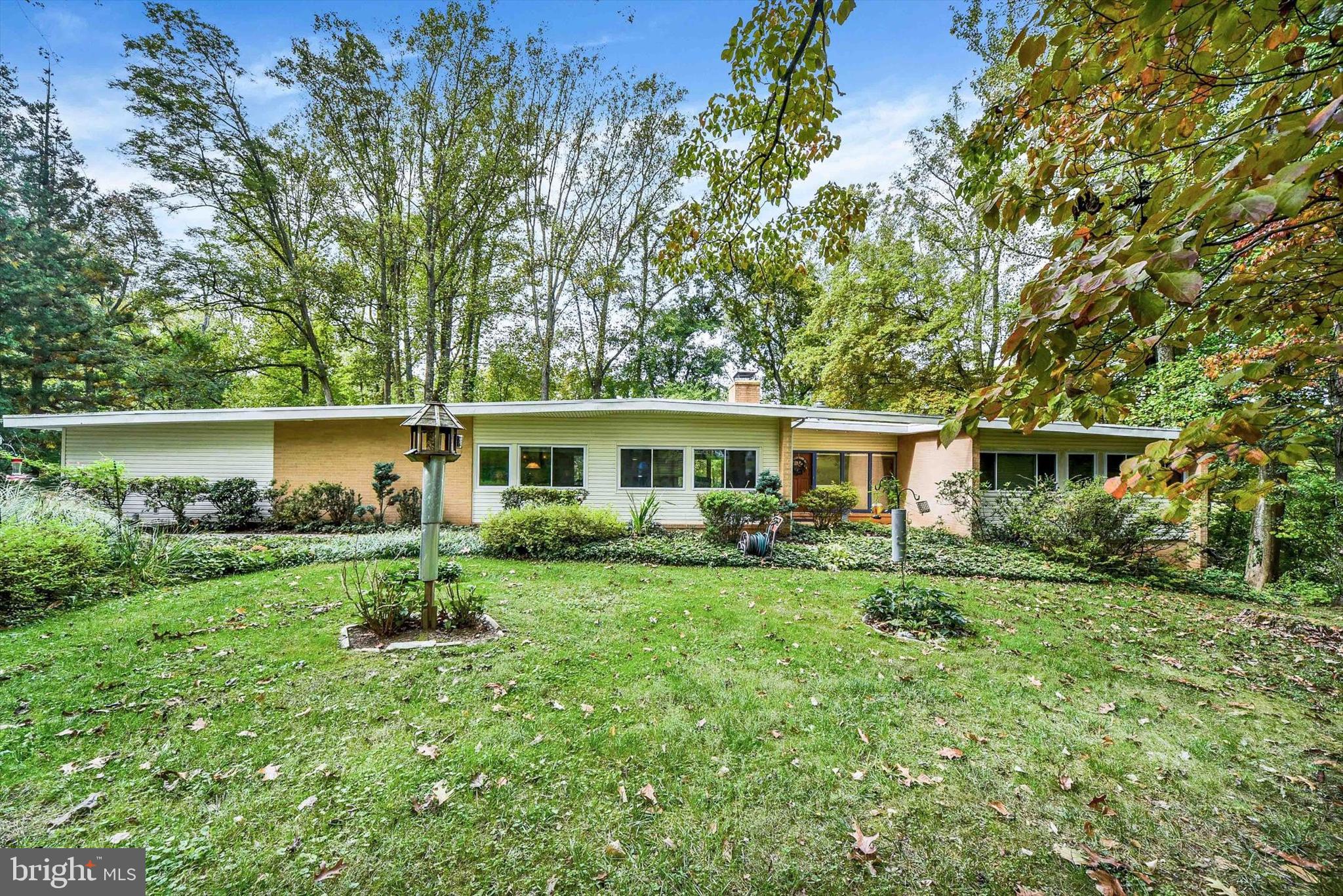 COMING SOON - GOING LIVE ON FRIDAY 10/13 - OPEN HOUSE 10/14. MOVE IN TO THIS MID CENTURY MODERN RANCHER IN THE HIGHLY DESIRABLE, RARELY AVAILABLE WOODED SANCTUARY OF CAVESWOOD. GLEAMING HARDWOODS & HANDSOME CEILING BEAMS IN THE LIVING ROOM/DINING COMBO. TAKE IN THE NATURAL BEAUTY FROM THE FLOOR TO CEILING WINDOWS & SLIDING GLASS DOORS. FULLY UPDATED EAT IN KITCHEN FROM 2019. MUDROOM, WORKSHOP & SUN ROOM OFF OF 2 CAR GARAGE. FAMILY ROOM W/ WOOD STONE & GORGEOUS STONE MANTLE & BUILT INS. PRIMARY SUITE ON MAIN LEVEL. PLUS 2 ADDITIONAL BEDROOMS & FULL BATH W/ DOUBLE VANITY ON MAIN LEVEL. LOWER LEVEL BOASTS LARGE GAME ROOM UPDATED 2022 W/ SLIDING GLASS DOORS, BONUS BEDROOM, HALF BATH PLUS LARGE STORAGE/LAUNDRY AREA. ABSOLUTELY PICTURESQUE GROUNDS, WILDLIFE & NATURE ABOUND AS PROPERTY BACKS UP TO PROTECTED WOODED AREA.