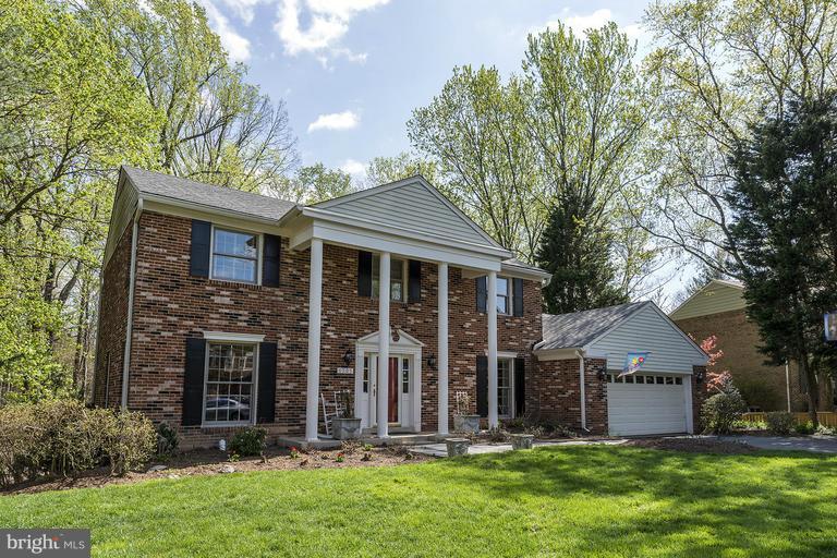 A lovely updated and expanded colonial on a cul de sac * Backs to parkland * Walls of windows offering great vistas * Hardwoods on main and upper levels * Walkout lower level with au pair suite, exercise room and wet bar * Main level open floor plan * Open floor plan on main level * Gourmet kitchen * Minutes to Tysons & the GW Parkway to DC