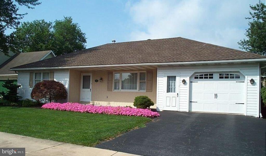Beautiful one story living! This home is nestled quietly in a cul de sac offering gorgeous hardwood floors, 2 full baths, four seasons room and 1st floor laundry. Many updates and colorful, well sculpted landscaping. New roof in 2008.