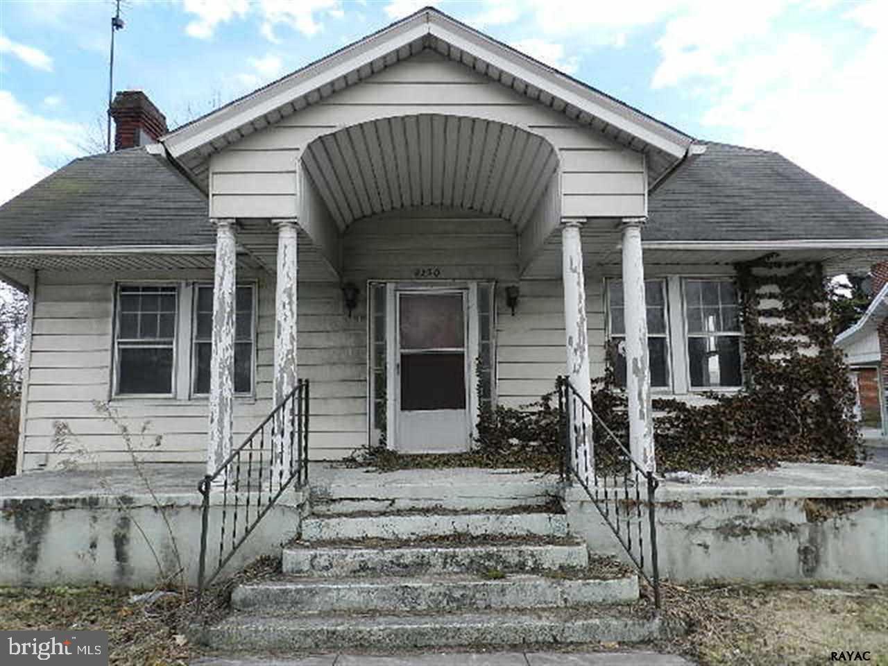 Level lot, 2 car garage, Ample off street parking. Covered front porch. Spacious rooms. Living room with brick fireplace. Hardwood floors. Den. Enclosed Porch. First floor bedroom and full bathroom. 2nd kitchen on second floor. On the 1st floor there is a full bath, 1/2 Bath, & Rm w/Sink. Minutes to RT30 & all conveniences. High traffic count, Many possible uses.
