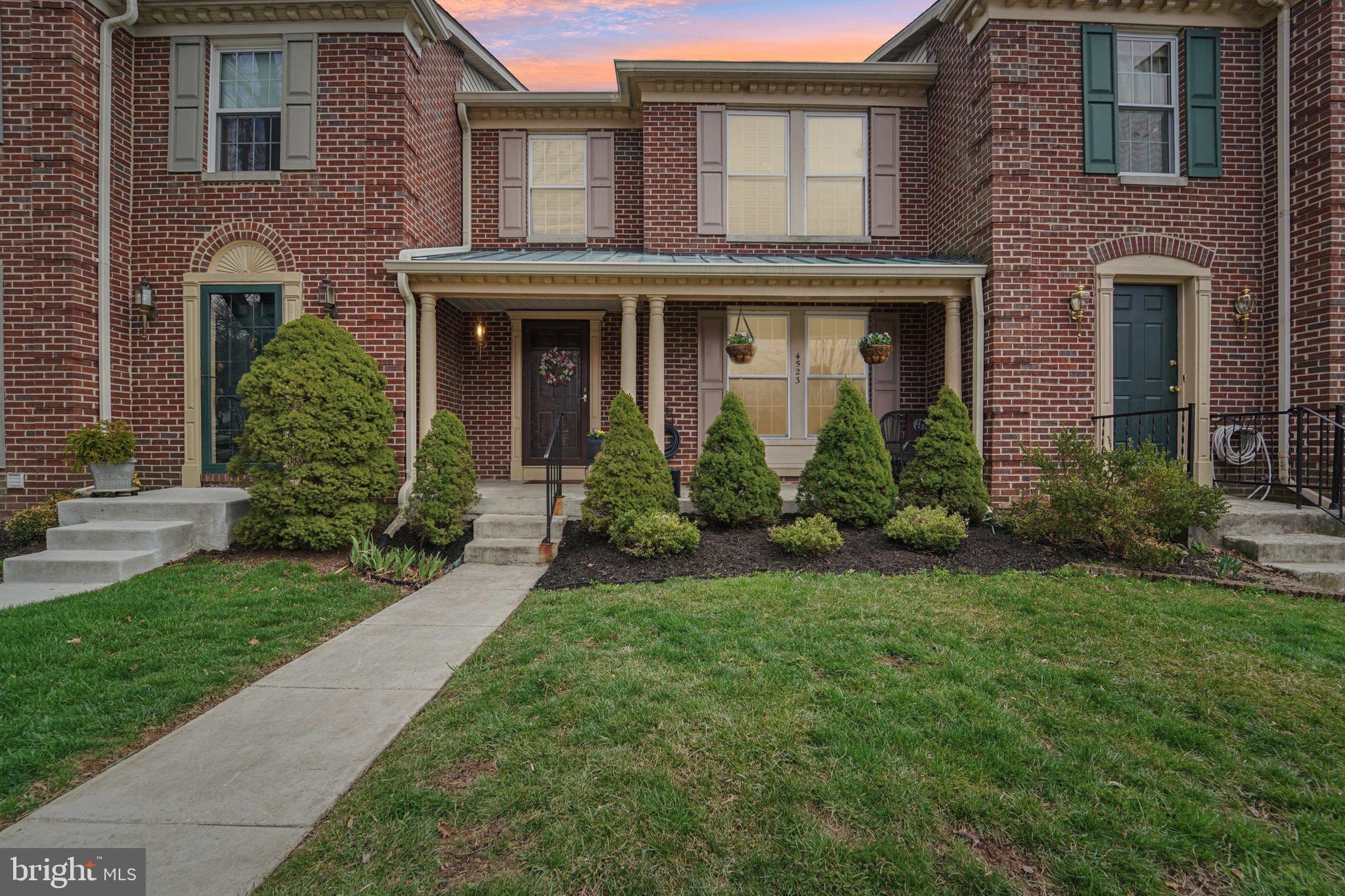 Welcome to 4523 Kingscup Court, a beautiful brick front townhome nestled in the sought after community of Dorsey Hall. Freshly painted throughout and featuring updated bathrooms, this home has been thoughtfully refreshed and is move-in ready. New carpet has been installed in the primary bedroom, basement, and piano room/fourth bedroom, while all remaining carpet was recently replaced in 2024 and has just been professionally steam cleaned. The main level is open and bright, featuring a spacious living room, a dedicated dining area, and a stunning kitchen complete with granite countertops, stainless steel appliances - perfect for both everyday living and entertaining. Upstairs, cathedral ceilings create an airy, light filled atmosphere. The primary suite offers a private bath, while two additional bedrooms and a well appointed hall bath provide plenty of space for family or guests. The finished walk out lower level adds incredible versatility, offering a fourth bedroom or bonus room ideal for a guest suite, home office, or additional living space, along with a full bath. Enjoy outdoor living on the spacious two-level deck, perfect for relaxing or hosting gatherings. Additionally, a large community field is available directly across the street. During the summer, some residents will invite the neighborhood kids for movie night with a projector and kids will bring mats and lawn chairs. The Kingscup community has an herb garden planter box and residents can grow and pick herbs. Soccer goals and baseball games are frequently seen in the community space, as are neighborhood parties.  Ideally located near major commuter routes including Maryland Route 29, Route 100, Route 32, and I-95, this home provides easy access to shopping, dining, parks, and everything the surrounding area has to offer. A perfect blend of comfort, style, and convenience!