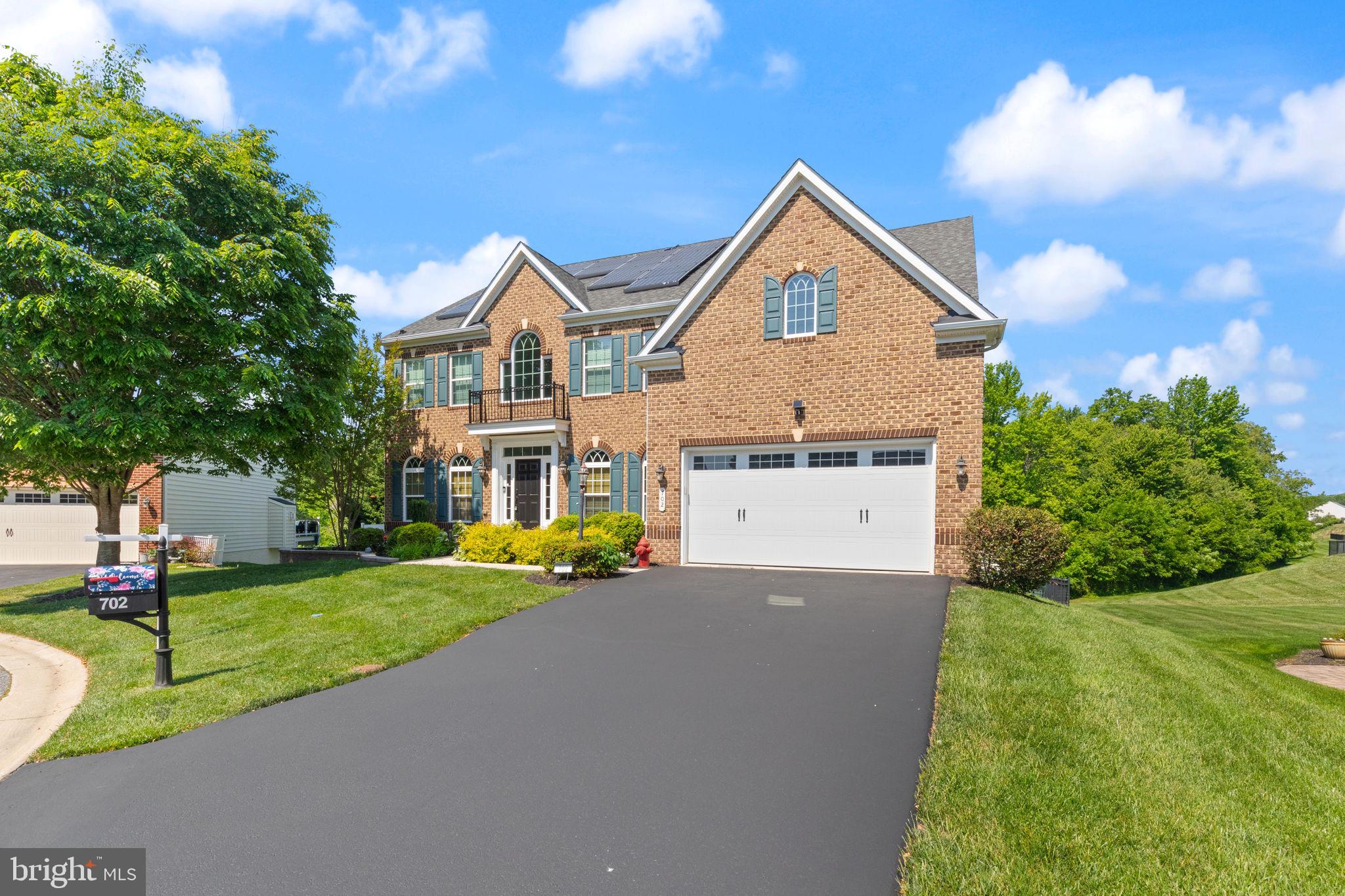 Back on the market with a price adjustment for quick sale!! Buyer's home sale contingency expired. No inspection or appraisal was carried out. Welcome to this impeccably maintained 4000 above grade sf, five-bedroom, 4.5-bath brick-front colonial located on a quiet cul-de-sac in the desirable Paddocks at Bulle Rock community! Low monthly HOA of $65! A grand two-story foyer greets you upon entry, leading to a beautifully appointed main level featuring gorgeous hickory hardwood flooring, decorative columns and moldings, built-ins, bump-outs, front and back staircases, surround sound, and a cozy fireplace. The spacious eat-in kitchen offers 42-inch cabinetry, new countertops and backsplash, stainless steel appliances, a large breakfast bar, and access to an expansive maintenance-free deck overlooking the private rear yard. The main level also includes a separate laundry room and private home office. Upstairs, you’ll find two primary suites, including a luxurious main suite with two walk-in closets, separate vanities, and a soaking tub, while the second suite offers a private bath and beautiful backyard views. A third bedroom features its own private bath, and the remaining two share a hall bathroom. The walk-out lower level with full windows provides abundant natural light and awaits your finishing touches. Step outside to your backyard retreat complete with an inground saltwater pool, new paver patio, hot tub, large entertaining space, fenced yard, and storage shed. Additional upgrades include solar panels, quartz countertops, a new HVAC system with added attic insulation, epoxy garage floor with upgraded lighting, 40-amp EV charging service, generator inlet box, UV window protectant, new LifeProof flooring in three bedrooms, Samsung washer and dryer, refrigerator, and fresh paint throughout. Ideally located near APG, I-95, and historic downtown Havre de Grace, this home offers timeless elegance, modern upgrades, and resort-style living all in one. One year home warranty provided by the Seller!