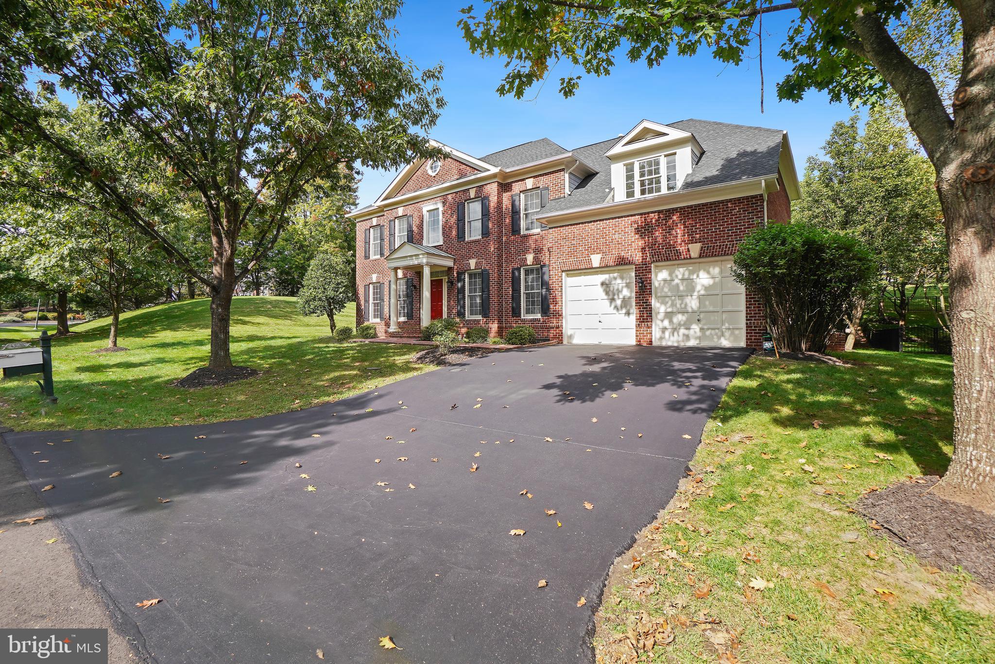 Substantial price reduction by 40k. Beautiful single family home, with bricks all four sides, nestled in the heart of River Creek residential community surrounded by golf course and other amenities for the elites where luxury Living awaits you! Explore the Colonial Avenel w/sun room model + options, with updated master bath  in the prestigious River Creek community! Welcome home to sophistication and style! This exquisite four-bedroom, four-and-a-half-bath residence is a masterpiece of design and comfort. Renovated , entire house  with new paint, new carpet and new flooring. Explore into elegance and marvel at the soaring two-story foyer, the entrance sets the tone for the entire home. Immerse yourself in the luxury and detailed trim work throughout,  The heart of the home is a modern white gourmet kitchen, a culinary haven with granite  countertops and backsplash. High-end stainless steel Viking appliances, a spacious center island with storage, a built in task desk, and a sunlit breakfast room make this kitchen a dream for any house owner. Relax in the two-story family room, bathed in natural light and centered around a gas fireplace. Hardwood floors  create a warm and inviting feeling throughout the home. Find inspiration in the library room, the perfect work from home location. The finished walkout basement, offers endless possibilities for work or play.. Seller Prefers Origin Title and Escrow for Closing.