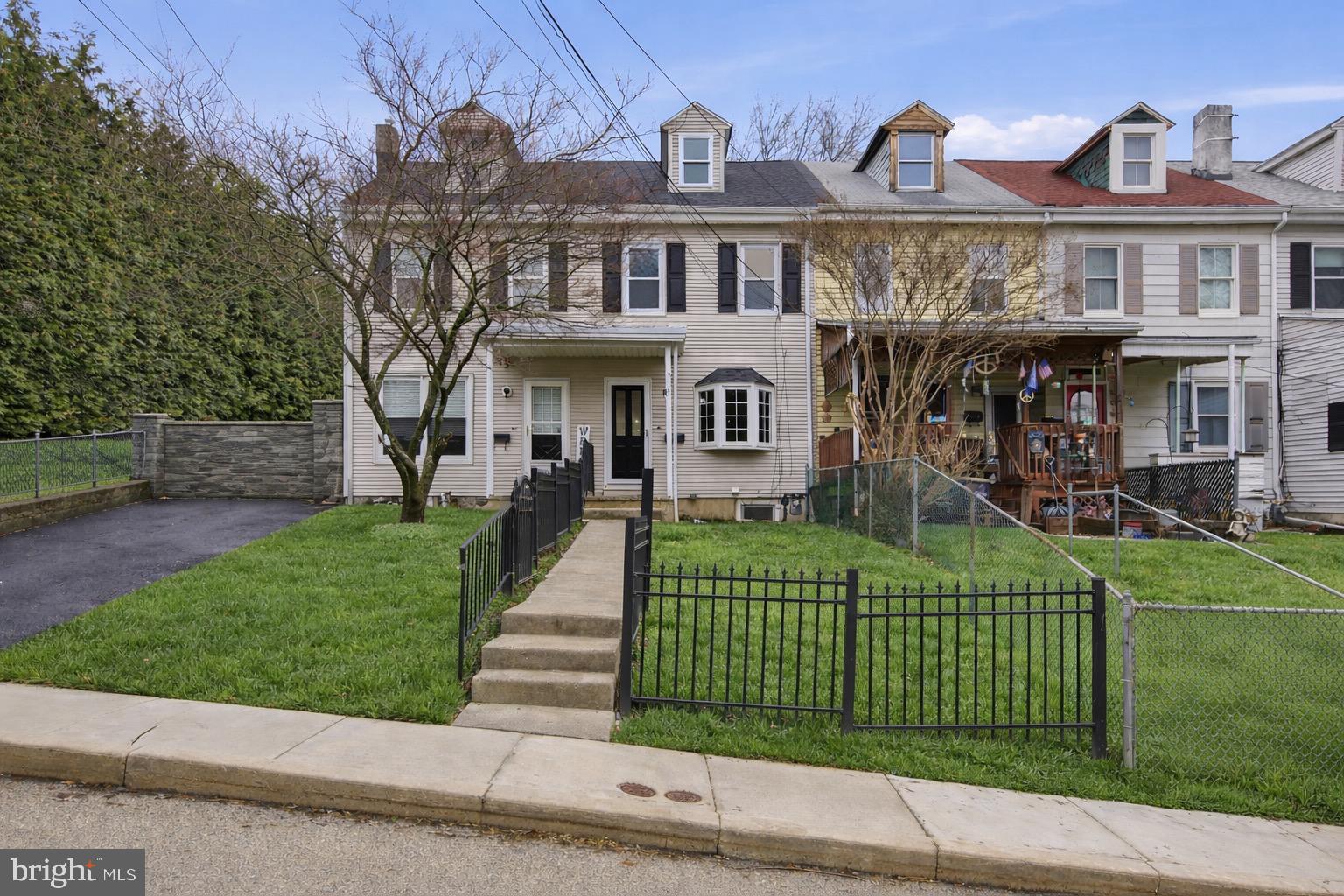 Charming full new rehab in quiet location in West Conshohocken. Interior townhouse has been completely renovated, shows like a brand new home inside!! All new Hickory hard floors throughout 3 levels, a fantastic new kitchen was moved to larger middle room,  with quality solid wood shaker cabinets, upgraded stainless steel appliances, an island provides seating for 4 that provides a great social space. 2 living areas found on 1st floor, with a front main living/tv room and also a smaller sun room in the rear that has a huge 8' slider that leads out to a newly rebuilt rear patio space. 2nd floor has a large light filled primary bedroom with a nice sized closet space. @nd bedroom also on this floor. A fantastic brand new bathroom with double vanity , tub with a custom fully frameless glass enclosure (on order, not in photo). Upstairs to 3rd floor is a spacious private attic bedroom , with closet space. Fully finished basement provides another bonus space that could be used as another living space/ kid area/ many options here. There is also a half bathroom been added here. A washer and Dryer also is basement. Central A/C, upgraded 200 Amp electric service, new windows, new roof, new plumbing and elec, recess lighting and ceiling fans. All found in a great West Conshy location that is very convenient to shops/ restaurants/ KOP/ major highways/ airport/ and all Conshy has to offer. Quiet street allows for easy parking. This is a fantastic like new townhome. Move right in!!