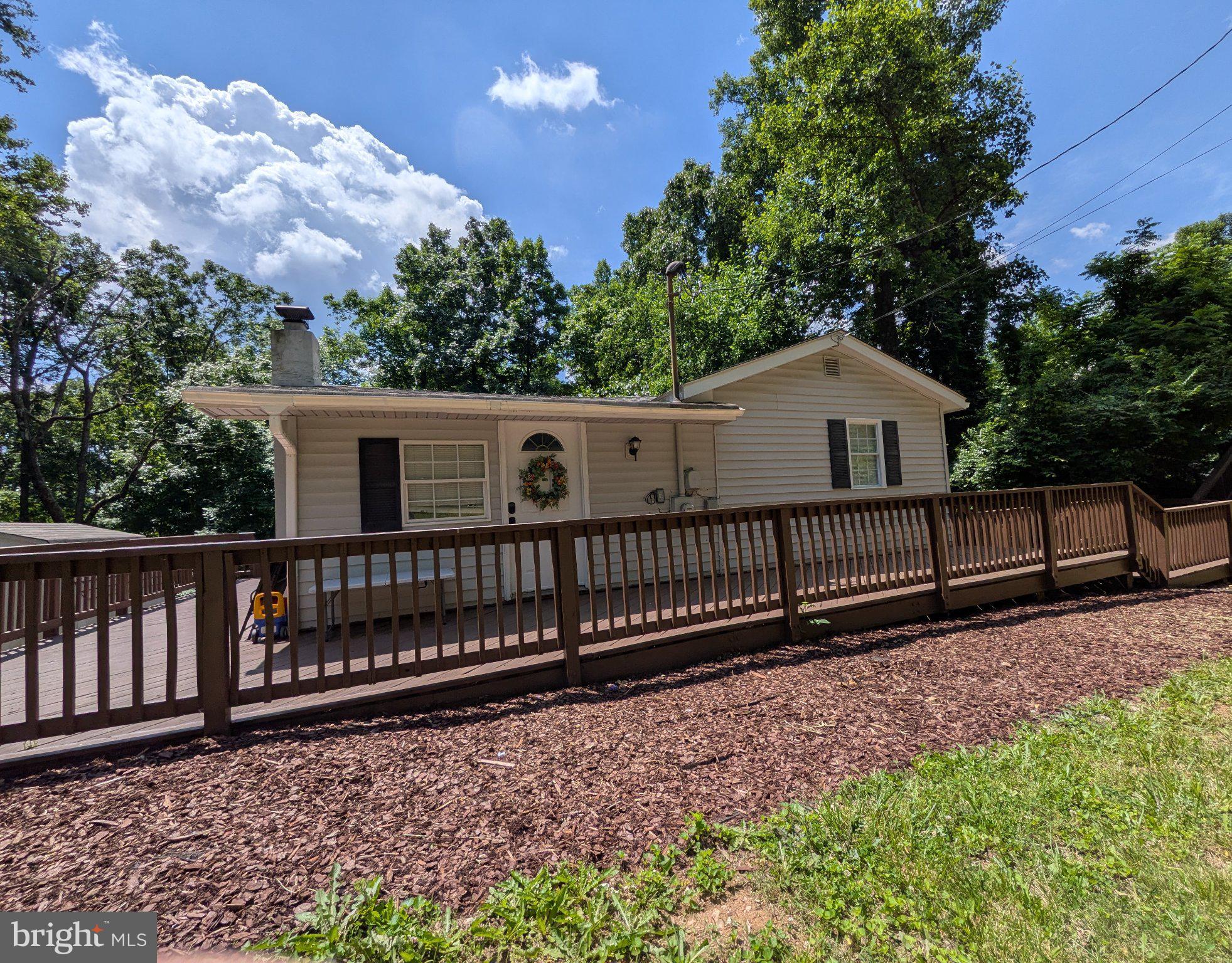 Charming home with fresh updates throughout! Enjoy a full wrap-around deck (recently painted) perfect for relaxing, plus an enclosed fenced yard and exterior shed with shelving for extra storage. Inside, the freshly painted interior shines with modern conveniences: new stove, fridge with ice maker, dishwasher, kitchen faucet, washer, bathroom fixtures/toilet/mirror/light, plus pantry shelving.
Recent upgrades include a 3-year-old well tank and water heater, 1-year-old water softener, and a new basement door—ready for comfortable living with low maintenance ahead. Don’t miss this move-in ready gem!