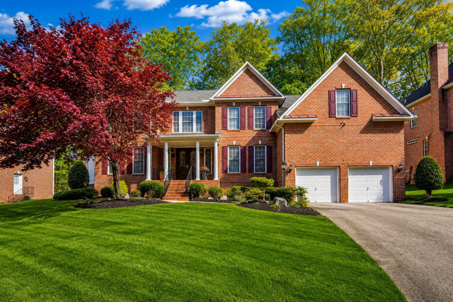 PRICE IMPROVEMENT! A rare opportunity to own a luxury former model home in the prestigious Heritage Walk community of North Bethesda.

Perfectly sited on a premier .49-acre cul-de-sac lot, this exceptional Custom Williamsburg Group estate offers over 9,000 square feet of refined living space, where timeless architecture meets grand scale and everyday functionality. From the moment you arrive, a long private driveway, brick paver walkway, and stately columned porch set an impressive tone. Inside, a dramatic two-story foyer unfolds with dual cascading curved staircases, creating a striking architectural centerpiece.

Formal living and dining rooms are richly appointed with crown molding, chair rail, and hardwood flooring, offering sophisticated spaces for entertaining. At the heart of the home, the gourmet kitchen is designed for both everyday living and hosting, featuring professional appliances, gas cooking with custom hood, granite countertops, a large center island, and a butler’s pantry/coffee station with ice maker.

The kitchen flows seamlessly into sun-filled breakfast and morning rooms, with direct access to a private composite deck—ideal for indoor-outdoor living. Just beyond, the impressive two-story family room is framed by floor-to-ceiling windows, architectural columns, and a statement fireplace, creating a grand yet inviting gathering space.

The main level continues with thoughtfully designed spaces including a private study, conservatory, piano room, and a functional mud/laundry area.

Upstairs, the expansive primary suite serves as a true retreat, complete with a spacious sitting room, beverage center, spa-inspired bath with soaking tub and multi-head shower, and generous walk-in closets. Additional bedrooms include a private guest suite and two bedrooms connected by a Jack-and-Jill bath.

The fully finished lower level is designed for entertaining and extended living, featuring a custom kitchenette with multiple appliances, a large recreation area, media/flex space, guest quarters, and a full bath.

Outdoor living is equally compelling, with a composite deck and rear balcony overlooking a spacious backyard—an ideal canvas for creating a custom outdoor retreat.

The home’s expansive layout also offers flexibility for multi-generational living, a potential au pair or in-law suite, or additional customized living spaces (buyer to verify feasibility).

Ideally located near Cabin John Park, Montgomery Mall, Pike & Rose, Strathmore, and major commuter routes, this home offers a rare blend of luxury, space, privacy, and convenience.

Now offered at $1,775,000, this is a compelling opportunity to personalize a premier estate. Schedule your private tour today.

Some photos may include virtual staging or conceptual renderings for illustrative purposes only. Buyer to verify all feasibility.