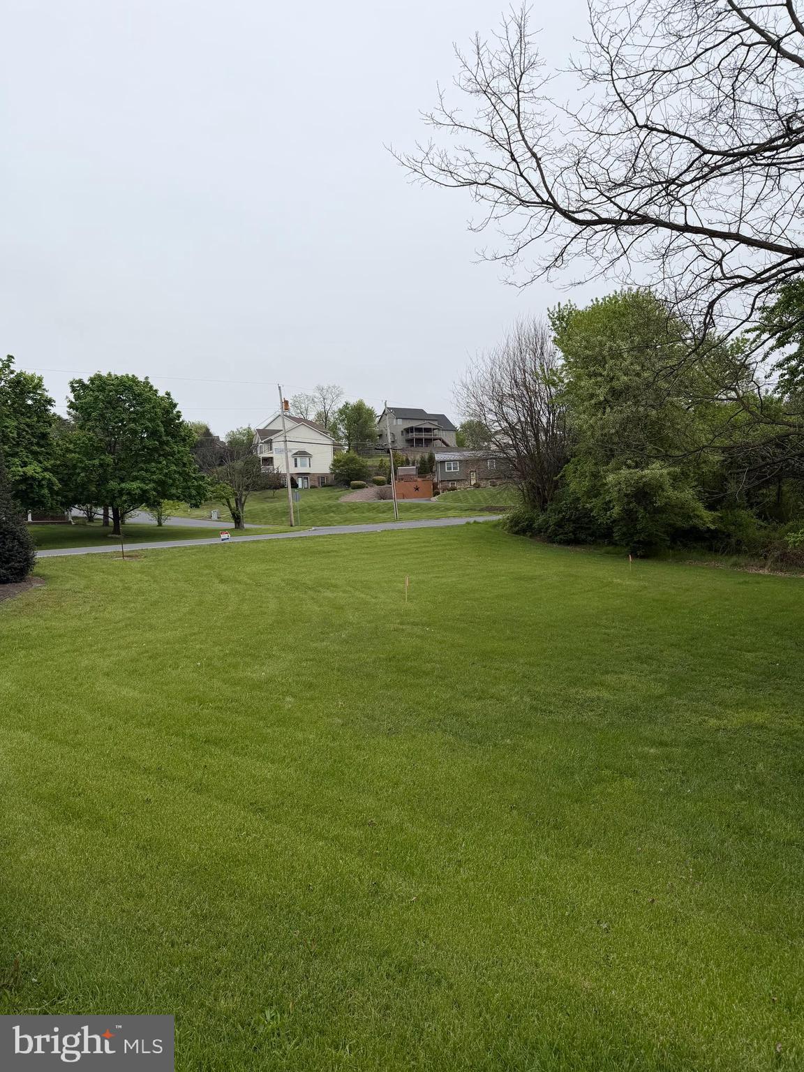 Beautiful  building lot with peaceful back yard along a stream.  Public water and sewer available .  Build your dream home