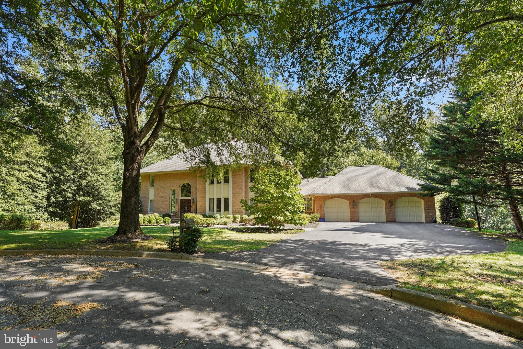 Immaculately maintained brick colonial in prestigious Falconhurst community, the 2-acre+ lot neighborhood.  6 bedrooms 6 full baths, more than 6800 total finished square feet. 2-story grand foyer. Formal living & dining. Renovated gourmet kitchen with huge island, 48" Viking 6 burner stove & range. Built-in refrigerator, wine cooler, warming drawer. 2-story Family room off kitchen with dramatic stone FP & wet bar. Main level office or in-law suite with full bath. Primary bedroom with custom built walk-in closet, Luxury primary bath with jaccuzi & separate shower room. Fully finished full walkout level basement with large recreation room, exercise room, a potential home theatre, 6th bedroom & 2 full baths.  Amazing 2-acre private lot sitting on quiet cul-de-sac, backs to woods & stream with 4-season gorgeous view. 3-car garage, expansive driveway.  Large deck. Convenient location with easy access to Democracy Blvd and River Road. Minutes to Potomac Village, I-270 & I-495. Great public schools: Churchill HS/Hoover MS/Seven Locks ES. Immediately available. Move in ready!