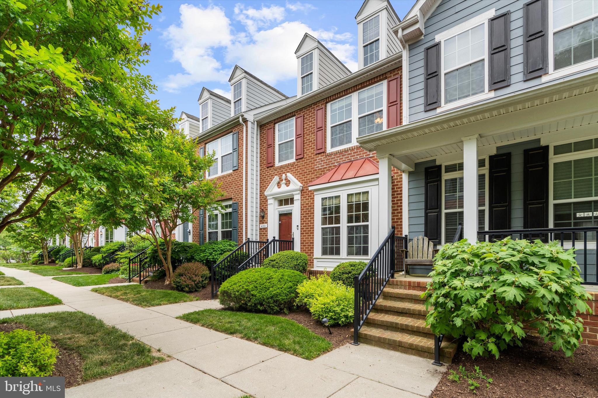 Welcome to this beautifully maintained 3-level townhome in the heart of Easton. Featuring three bedrooms, two full bathrooms, and one half bathroom, this home is designed for comfortable everyday living and easy entertaining. The spacious layout offers multiple levels of living space, providing everyone with room to spread out and enjoy., along with the peace of mind of a Brand New Roof and Brand New Water Heater! The main living area flows seamlessly into the kitchen and dining spaces, while large windows bring in plenty of natural light throughout the home.  Step outside to enjoy the spacious back deck, perfect for morning coffee, outdoor dining, or relaxing evenings with friends and family. Upstairs, find a large primary bedroom with a walk-in closet and en-suite bathroom. Two guest bedrooms and a full hall bath complete this level. You will love the finished basement level and the attached 2-car garage offering convenience, play space, extra storage, and easy parking. Located in a desirable Easton community walking distance to downtown, with direct access to Rails-to-Trails, close to shopping, dining, parks, and local amenities, this townhome offers low-maintenance living with plenty of room to grow. Don’t miss your opportunity to own this move-in-ready home in one of the Eastern Shore’s most charming towns! Motivated Sellers, schedule your showing today!