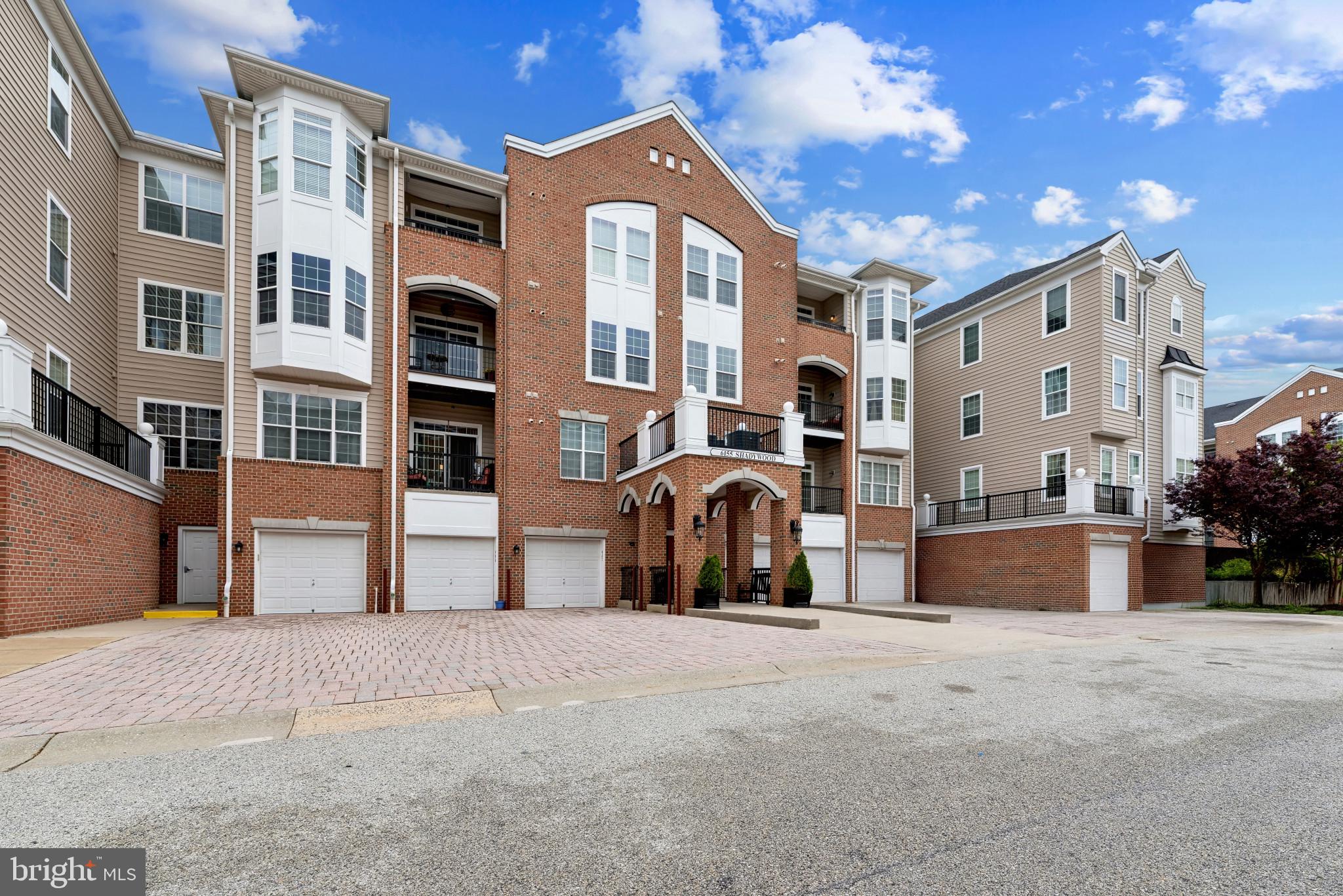 Beautifully updated Colonial-style top-floor non-smoking condominium offering 2 bedrooms, 2 bathrooms, 1,458 finished square feet, and a 1-car detached garage in the sought-after 55+ community of Gatherings at Lyndwood. // Freshly painted interiors and stylish laminate flooring welcome you into the foyer, where a carpeted formal dining room sits to the right, perfect for hosting. To the left, the thoughtfully updated kitchen features newly updated (April 2026) quartz countertops and stainless steel appliances, a replaced faucet, a pantry, and a breakfast bar that opens seamlessly to the expansive living room with a tray ceiling and access to a covered balcony—ideal for everyday living and entertaining. // The well-designed layout continues with two spacious bedrooms featuring newly installed carpet (April 2026), each offering generous closet space, including a walk-in closet. Two full bathrooms, updated in 2022, add modern appeal, along with a conveniently located laundry room. // The primary suite serves as a private retreat, complete with a beautifully updated en-suite bath featuring a newly updated quartz vanity top (April 2026), as well as a charming columned sitting area with bay windows that fill the space with natural light. // Additional highlights include an HVAC system updated in 2024 and a covered balcony perfect for relaxing outdoors. // Residents of Gatherings at Lyndwood enjoy access to a variety of resort-style amenities, including a community pool, fitness center, pickleball court, and a clubhouse, all ideally situated adjacent to a scenic public golf course for added recreation and picturesque surroundings. This is a non-smoking building. *Select photos have been enhanced with virtual staging for illustrative purposes only.