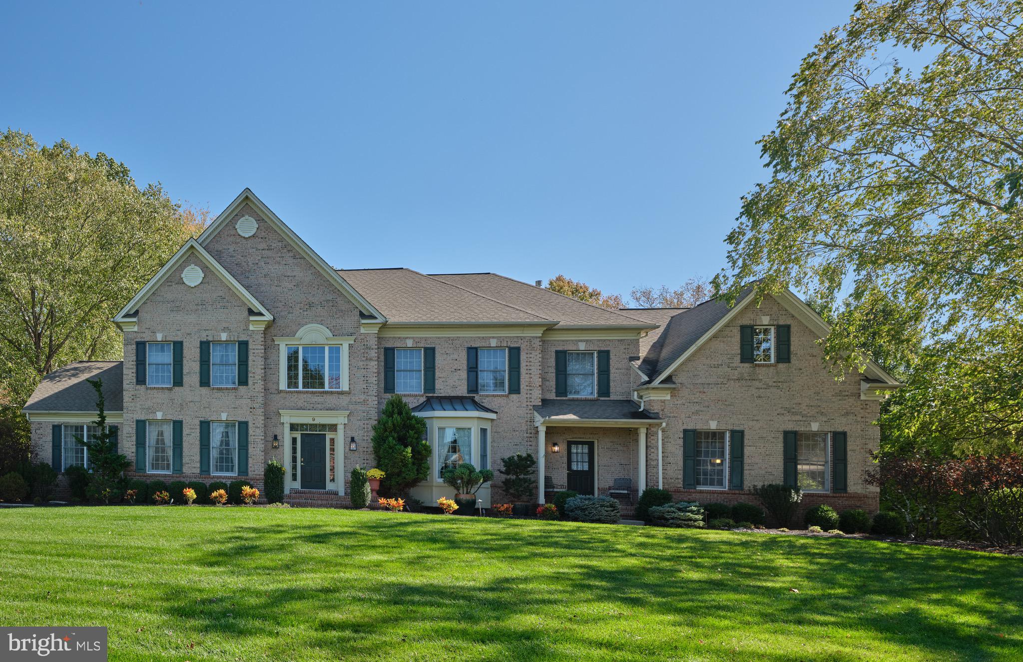 Welcome to 9 Pickering Drive — A Masterpiece in Prestigious Pickering Chase.
Nestled within the sought-after community of Newtown Township, and part of the acclaimed Council Rock School District, this stately brick manor is being presented to the market for the first time. With over 5,900 square feet of elegant living space, 9 Pickering Drive perfectly blends grandeur, comfort, and timeless design.
As you arrive, the home’s classic brick façade and refined curb appeal set the tone for what lies beyond. Step inside the two-story curved foyer, where light and architectural drama greet you at every turn. Formal living and dining rooms flank the entry, offering sophistication for entertaining. The conservatory, wrapped in glass walls, bathes the space in natural light—while a private office provides the perfect setting for quiet work or reading.
The heart of the home is the two-story great room, anchored by a striking floor-to-ceiling brick fireplace and open to the newly designed gourmet kitchen. This chef’s dream features floor-to-ceiling 42-inch cabinetry, a walk-in pantry, oversized island, dual sinks, and a full Wolf appliance suite. Thoughtful flow connects this space to the mudroom, laundry area, and three-car garage, ensuring convenience for daily living.
Upstairs, a secondary open foyer overlooks both the grand entry and great room below. The primary suite, privately tucked in its own wing, is a true retreat—featuring two walk-in closets, dual private bathrooms, and an inviting sitting area. Each auxiliary bedroom is generous in scale, offering ensuite baths, double closets, and luxurious comfort for family or guests.
The walk-out lower level expands the home’s living and entertaining options, leading to a private backyard oasis. This finished space offers media,  game/entertainment area,(with a full refrigerator0, exercise room, ample storage, and more—perfect for both relaxation and recreation. This is not your ordinary lower level- truly a Mecca for additional living space for your entire family. 
Pristine in its care, yet warm and inviting, this residence captures the essence of refined Bucks County living. Its unparalleled location offers effortless commuting via nearby highways and rail lines—just 35 minutes to Philadelphia or one hour to New York City—while minutes away from Newtown, Yardley, and Princeton Boroughs with their rich culture, dining, and boutique shopping.
Welcome home to perfection. Welcome home to 9 Pickering Drive. 
( 9 PIckering will be accepting appointments this Sunday 11/2, from 12-4 PM.  You can call me directly or. your agent for an appointment on Sunday 11/2
