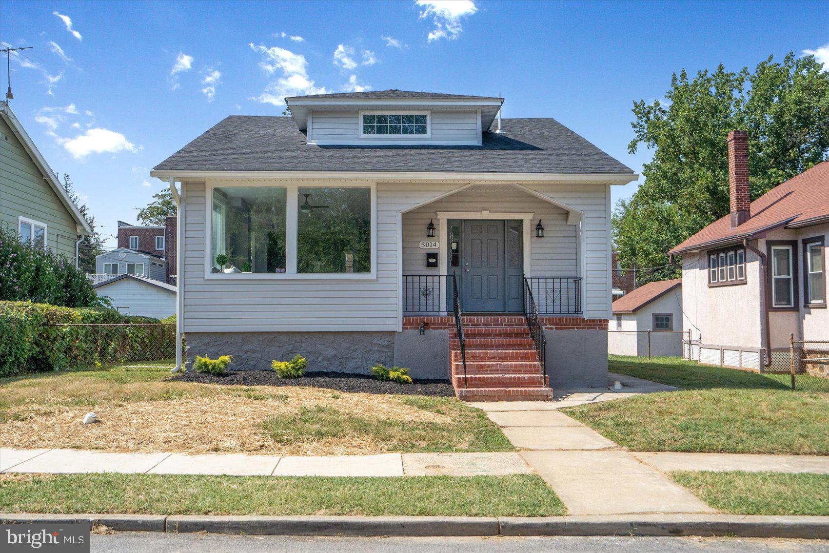 Fully renovated home top to bottom including  new flooring, new bathrooms, new kitchens, new siding, new hvac/water heater etc. . Main level features all new hardwood floors, living room with a powder room, kitchen with granite counter tops and stainless steal appliances. The main level also has a first floor Primary bedroom with en suite bathroom newly. Upper level has 2 bedrooms and and a full bathroom. The lower level has an open area for entertainment, a bedroom, and full bathroom. Large back yard with a 2 car garage. Come see now before it's gone!!
