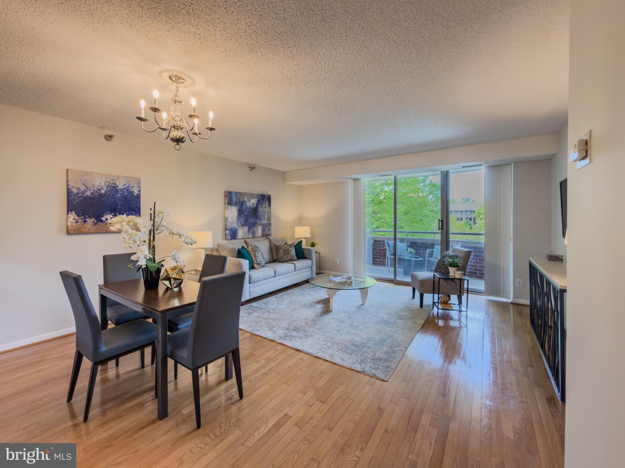 Beautiful, light filled 1 bedroom, 1 bath condo in sought after Fallswood. Recently renovated kitchen with updated cabinets and granite countertops. Hardwood floors throughout the main living area lead to a private balcony with pool views. Spacious bedroom with plush carpeting, walk-in closet, and in-unit washer and dryer. HVAC replaced.
Unit includes assigned garage parking and separate storage unit with ample guest parking. Full service building offering 24/7 front desk service, tennis courts, pool, roof deck with grills, library with book club, and a Terrace Room for gatherings. Small pets considered.
Ideally located near North Bethesda Metro, Whole Foods, Seasons 52, Woodhouse Spa, Shriver Aquatic Center, and the Bethesda Trolley Trail. Pike & Rose is just minutes away with dining, shopping, and entertainment options.
Garage Parking Space : From the lobby, walk toward the storage room but do not turn right. Walk straight through the room, through the door to the vestibule (elevator on your right), then straight through two more sets of doors. Space GU33 is the second space on the left from the big garage door.

.