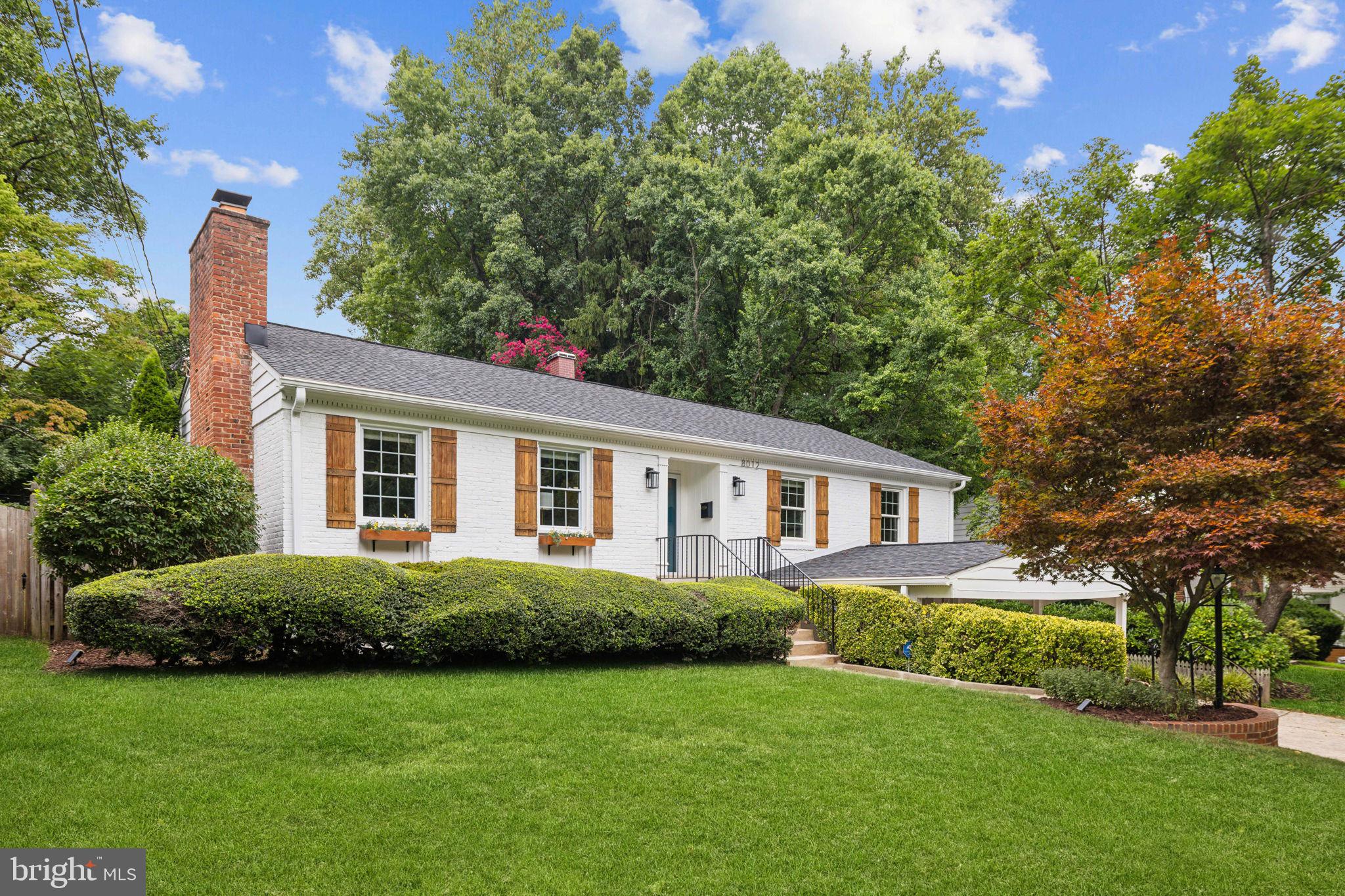 Welcome home to 8012 Beech Tree Road, a meticulously maintained gem in the highly sought-after Burning Tree Village community! With over 2,700 square feet of living space, this charming home blends classic appeal with modern updates, offering an exceptional living experience. The beautifully landscaped exterior with lush greenery and gardens creates a picturesque setting, leading to a thoughtfully updated interior with gleaming hardwood floors and a flowing floor plan that exudes both charm and functionality. The main level includes a spacious living room with a gas fireplace, a dining room ideal for gatherings, and a modern kitchen with a large island and breakfast nook. A highlight is a sunroom with a vaulted ceiling, newer tile flooring, and sliding glass doors opening to a private backyard oasis featuring an expansive flagstone patio and herb garden, perfect for al fresco dining. The generous primary suite includes two closets and an updated bath with dual vanities, while two additional bedrooms and a refreshed full bath complete this level. On the lower level is a spacious living area, a newly renovated full bath (2022), and a bonus room for an additional bedroom or office. Additional features include a storage & laundry area with a newer Samsung washer & dryer (2020), a small office/hobby room, and an oversized one-car garage. Recent upgrades include hardscape improvements & fresh interior paint (2024), new roof & gutter guards (2022), HVAC (2019), and living room windows (2022). For added peace of mind, a Cinch One-Year Home Warranty is included. Conveniently located just up the street from Burning Tree Elementary School & Park, this home offers easy access to 495/270, downtown Bethesda, Potomac, DC, and Northern VA. Don’t miss this opportunity to own this exceptional home in one of the most desirable neighborhoods in the Whitman school district. Schedule your visit today to experience all that 8012 Beech Tree Road has to offer!