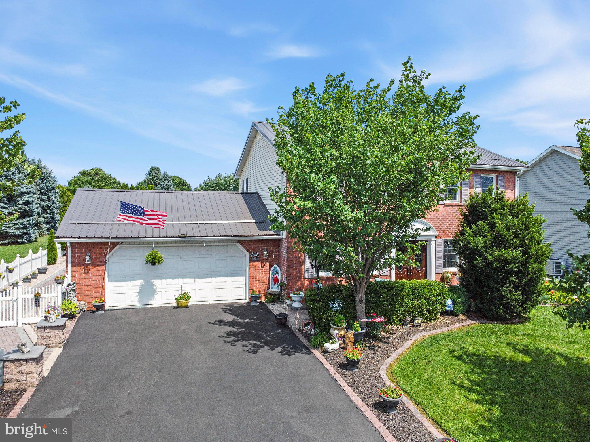 Welcome to an Italian villa and outdoor oasis with extensive hardscaping/garden and ponds that has koi and goldfish for your enjoyment and entertainment. This property is located in the desired community of Scot-Greene Estates. This beautiful well-kept home features a sunroom with a heated in-ground indoor pool, gas range to cook and prepare your own pizzas in an indoor second kitchen.  First floor has tile flooring throughout with an open stairway that separates the front office/dining room from living room.  Kitchen has upgraded granite countertop and backsplash. The island has a Jenn Air cooktop.  Wall ovens and space for microwave that conveys and ample cabinets with glass doors to display your crystal and special dinnerware. Enjoy a stone surround fireplace that can serve as your hearth room or dining area. Main floor has half bath for your convenience
Second floor has 4 bedrooms with the Primary bedroom having its own bathroom featuring double bowl vanity and walk-in shower. Main bath serves the other 3 bedrooms.  All upper-level flooring is beautiful hardwood. The finished cozy lower level has a second fireplace in the family room that has carpet flooring. A separate laundry room with lots of storage. Schedule to see for yourself, you won't be disappointed!  No sign on property as a request from seller. Looking forward to meeting you!