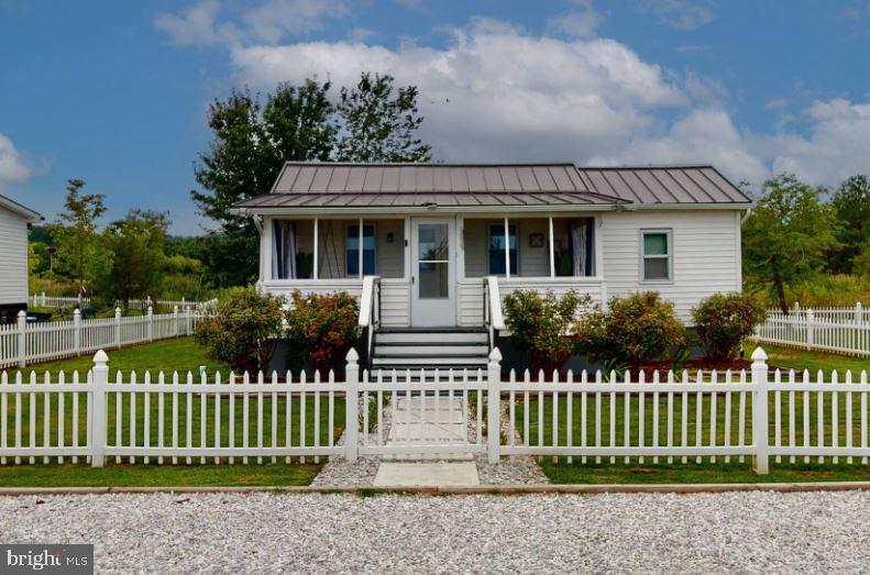 Chesapeake Beach Coastal Retreat 🌊

Welcome to 5237 Breezy Point Rd, Chesapeake Beach, MD — your perfect escape by the water!
✨ 2 Bedrooms, 1 Bath
✨ Sleeps 5–6 comfortably
✨ Steps from the beach
✨ Fully renovated & move-in ready
✨ Breathtaking sunrises and sunsets

Imagine waking up to the sound of the waves, sipping coffee while watching the sunrise over the Chesapeake Bay, and ending your evenings with stunning sunset skies just steps from your door.

This charming coastal retreat offers the perfect blend of relaxation and modern comfort, making it ideal as a primary residence, weekend getaway, vacation home, or investment property.
Enjoy beach walks, salty breezes, peaceful mornings, and the laid-back Chesapeake Beach lifestyle — all at an incredible value.

Whether you're entertaining guests, escaping city life, or searching for your own slice of waterfront paradise, this home delivers the lifestyle everyone dreams about.
You've got to come to this “Affordable Coastal Living Home With Private Beach Access — Without the Million-Dollar Price Tag.”  Still being within commuting distance to DC/MD/VA areas

At $380K, this listing hits a sweet spot for: first-time buyers, downsizers, weekend/vacation-home buyers
military buyers using VA buyers priced out of Annapolis waterfront living, remote workers wanting lifestyle over square footage

Come take a look and Say Yes to this Address! (The furnishings are negotiable)