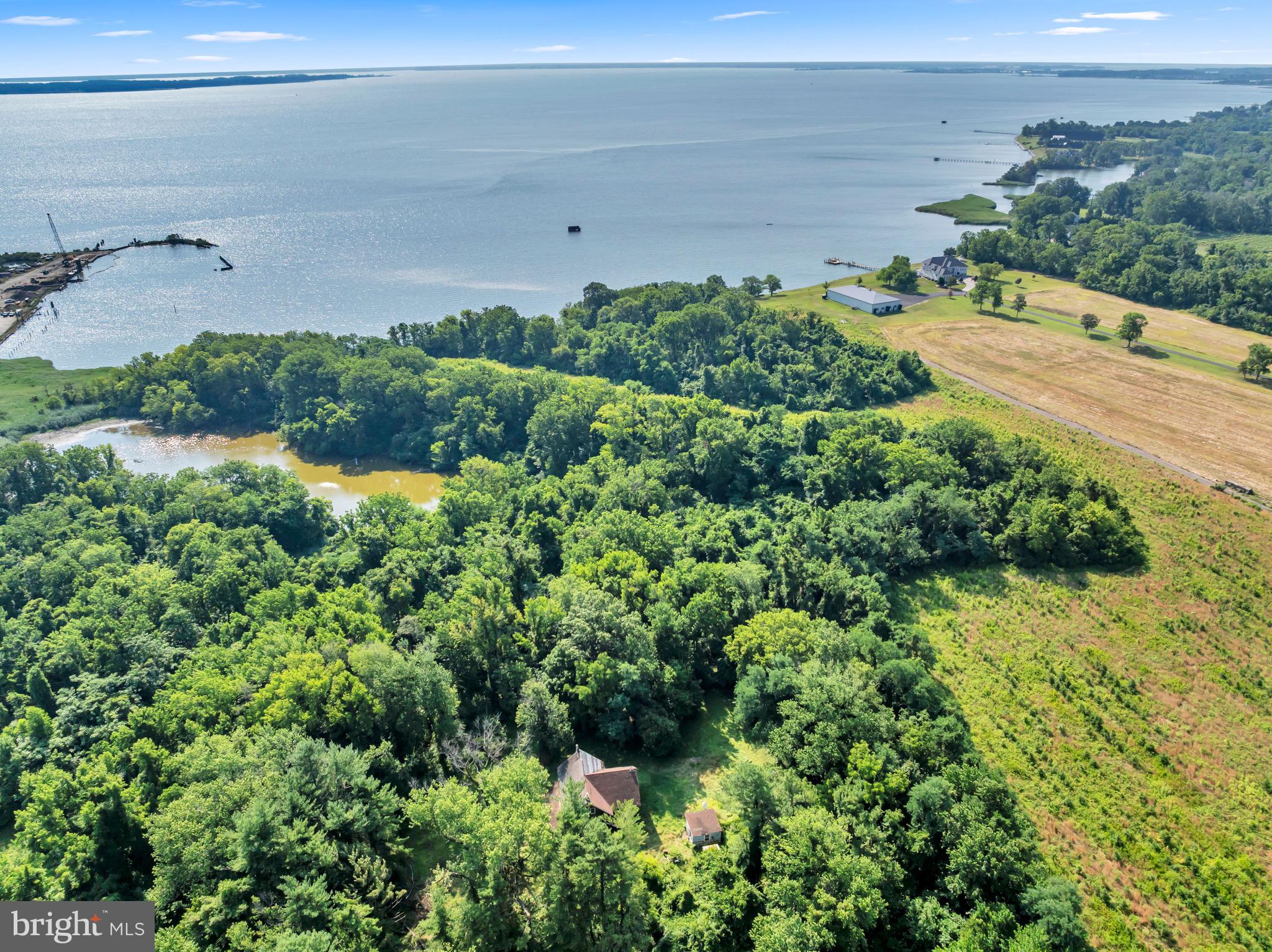 Rare opportunity in the highly coveted Love Point community of Stevensville! Nestled on 1.67 acres and bordered by the State of Maryland Department of Natural Resources, this unique property offers a private, peaceful setting surrounded by nature. The existing home is a true blank canvas and presents an incredible opportunity for investors, builders, or buyers with a vision to bring this property back to life. A full renovation is needed, but the possibilities are endless for creating a custom retreat in one of Queen Anne’s County’s most desirable locations. Enjoy the serenity of the natural surroundings while being conveniently located near waterfront destinations, marinas, shopping, dining, and commuter routes. Properties with this combination of acreage, privacy, and location are rarely available. Bring your plans, your imagination, and your vision—this is the perfect project for those looking to create something truly special in Love Point. This is an estate sale being sold strictly as-is.