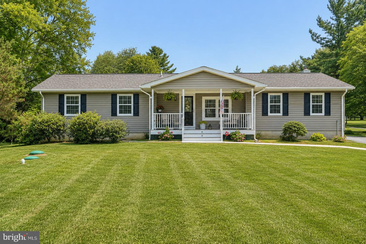 Welcome to your own private retreat on 3.21 picturesque acres in the heart of Middle River. Completely transformed from top to bottom between 2024 and 2025, this exceptional property offers the perfect blend of modern luxury, peaceful living, and incredible flexibility for today's lifestyle.

Unlike many homes on Ebenezer Road that share long driveways with neighboring properties, this home features its own private driveway, offering the privacy and exclusivity buyers have been searching for from the moment they arrive.

Step inside to discover a bright, open-concept floor plan filled with natural light and finished with brand-new luxury vinyl plank flooring throughout. The beautifully redesigned kitchen serves as the heart of the home, featuring quartz countertops, stainless steel appliances, abundant cabinetry, and generous prep space, making it ideal for both everyday living and entertaining. Just off the living area, a cozy reading nook nestled beside the fireplace creates the perfect spot to curl up with your favorite book, enjoy your morning coffee, or simply unwind at the end of the day.

The main level offers four spacious bedrooms and two beautifully renovated full bathrooms, including an incredible primary suite designed to feel like a private retreat. Complete with a spacious walk-in closet and a stunning ensuite bathroom, this space perfectly combines comfort and luxury.

The fully finished lower level expands the home's versatility with a private in-law suite featuring its own private entrance, bedroom, full bathroom, kitchenette, dedicated laundry room, and spacious living area. Whether you're accommodating extended family, welcoming long-term guests, or simply looking for additional flexible living space, this thoughtfully designed suite offers exceptional comfort and privacy. Even better, the layout provides space for the potential addition of a second bedroom, creating even more flexibility for future needs.

No detail was overlooked during the extensive renovation completed between 2024 and 2025. Every aspect of this home has been thoughtfully updated, blending timeless finishes with modern functionality. The home and detached two-car garage both feature brand-new architectural shingle roofs and new vinyl siding, while updated electrical includes separate electrical panels for both the main level and lower-level suite. Brand-new HVAC ductwork was installed in 2024, a new water heater was installed in 2023, and both the front porch and rear deck were completely rebuilt in 2024. Every window is outfitted with custom 2-inch wood blinds, adding warmth and timeless style throughout the home. The result is a home that has been beautifully reimagined! You truly wouldn't recognize it from its previous listing photos.

Outside, you'll enjoy 3.21 acres of beautifully maintained grounds with lush green lawns, mature trees, and plenty of room to relax, entertain, or simply enjoy the peaceful surroundings. The detached two-car garage, expansive driveway, and parking for up to eight vehicles provide ample space for family, guests, work trucks, recreational vehicles, or outdoor equipment.

Conveniently located just minutes from shopping, dining, I-95, and I-695, while also being close to the beloved Richardson Farms, this home offers the perfect balance of privacy and convenience. Located within the highly sought-after Vincent Farm Elementary School district, this is a rare opportunity to own a completely reimagined home where every major update has already been completed.

Luxury, privacy, exceptional craftsmanship, and true multigenerational living, all on over three beautiful acres. This is a rare opportunity to own a one-of-a-kind property that is truly move-in ready.