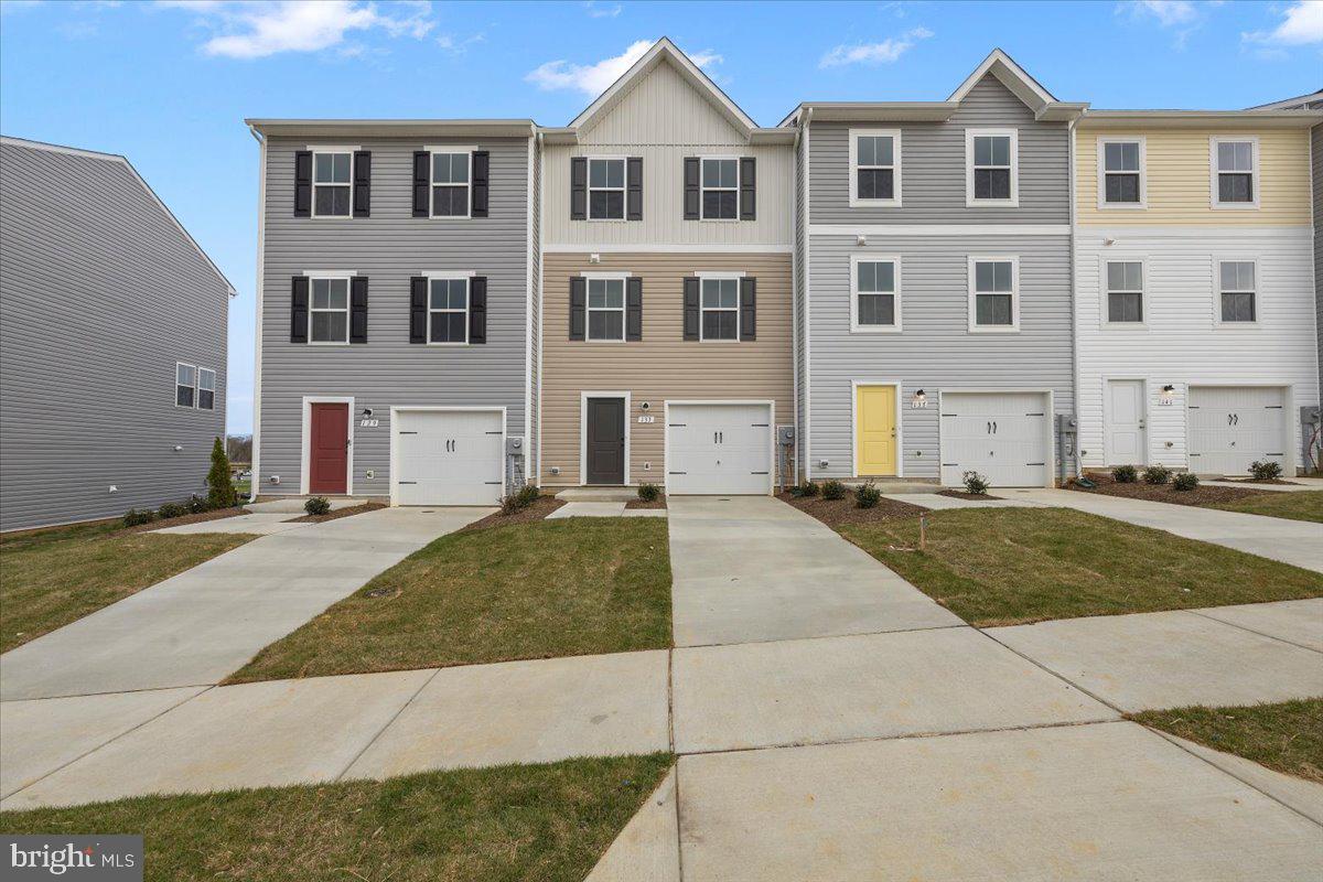 Mid April Move in!  KHOVNANIAN'S ASPIRE SERIES TOWNHOMES! Our Brand-new 3 story end Unit Adams IV, design offers 3 generously sized bedrooms 2.5 luxury baths, a large, finished rec room and full single car (or suv) garage! Dillon Farms community is situated perfectly with breathtaking Mountain views and convenient shopping and restaurants literally across the street!  Our main living area features a wide-open floorplan spotlighting a stunning professionally designed wildly popular, all inclusive "Farmhouse Look" kitchen with a giant island, farmhouse sink, granite counter tops, stainless steel appliances multi- cycle Dishwasher, electric Range/ Oven, built in Microwave and Disposal and washer/dryer!! Upgraded wood look vinyl flooring, Propane heating and hot water, Barricade Plus house wrap and 'Air Tite' energy seal package, 14 SEER air conditioning, low E double pane windows, insulated fiberglass front door and programmable thermostat are a few more of the benefits of a new KHOV Townhome at Dillon Farm! ALL BRAND NEW with a PWC WARRANTY! Furnished Model Now Open by appointment! Ask about Closing Costs paid by Builder with the use of K Hovnanian American Mortgage.