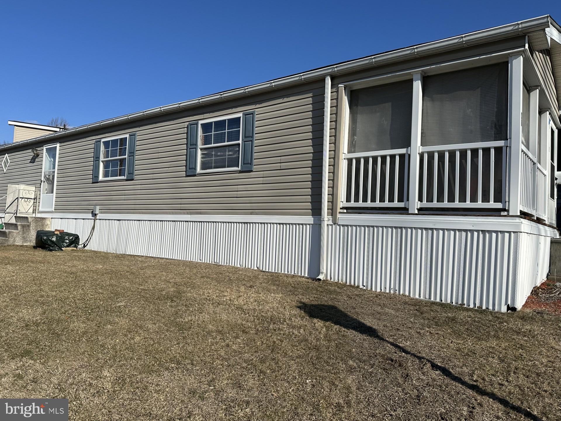 This well cared for 2BR 1 BA property is located in Urban Acres, a well maintained 55+ community.  Enter the property from a new storm door to a 14x18 screened porch.  Relax in a spacious 14x18 living room with ample afternoon sunlight, Enjoy the eat in kitchen and breakfast bar. Plenty of cabinets and storage space is available in this kitchen. Dishwasher and all other appliances remain with the property (newer oven/stove). Washer and dryer included with the property. Main bedroom is 11x11 with an additional 2nd bedroom.  A 12x12 shed is located on the property for additional storage. The home is heated with forced air propane heat and features central a/c, The furnace has been serviced annually by Bernville Fuels. The rent includes water, sewer, trash and snow removal.  Community clubhouse available. On-street parking. Pets allowed (restriction under 20 lbs. fee applies)
Property is sold as-is condition, Immediate possession. Listing Agent is related to Seller.