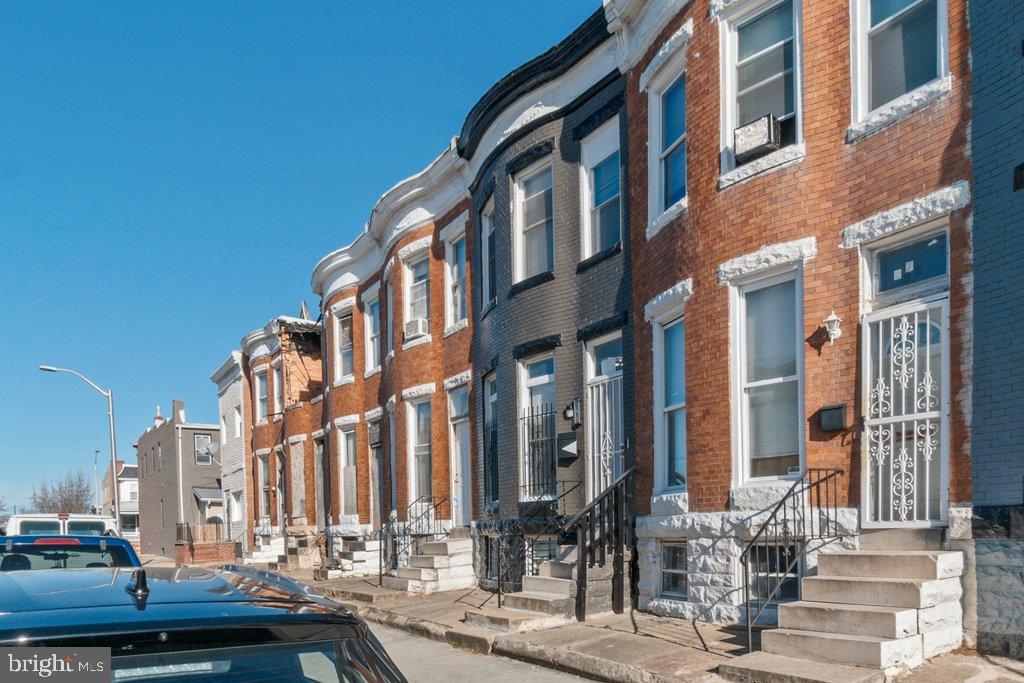 *****INVESTMENT OPPORTUNITY***** PROPERTY INCLUDES RENTAL INCOME OF $1450/MONTH (TENANT OCCUPIED). This exquisite Federal-style townhouse in the heart of Penrose offers a unique blend of historic charm and modern living. The inviting interior features a thoughtfully designed combination kitchen and dining area, perfect for entertaining or enjoying quiet meals at home. The rich brick exterior exudes timeless elegance, while the full basement provides ample space for storage or potential customization to suit your lifestyle. With its classic architecture and warm ambiance, this residence invites you to create lasting memories. Enjoy the convenience of on-street parking and the vibrant community surrounding you. This property is not just a home; it's a lifestyle choice that embodies comfort and sophistication. Embrace the opportunity to make this charming townhouse your own, where every corner reflects a sense of belonging and warmth. Experience the perfect balance of historic allure and modern convenience in this exceptional Penrose gem.