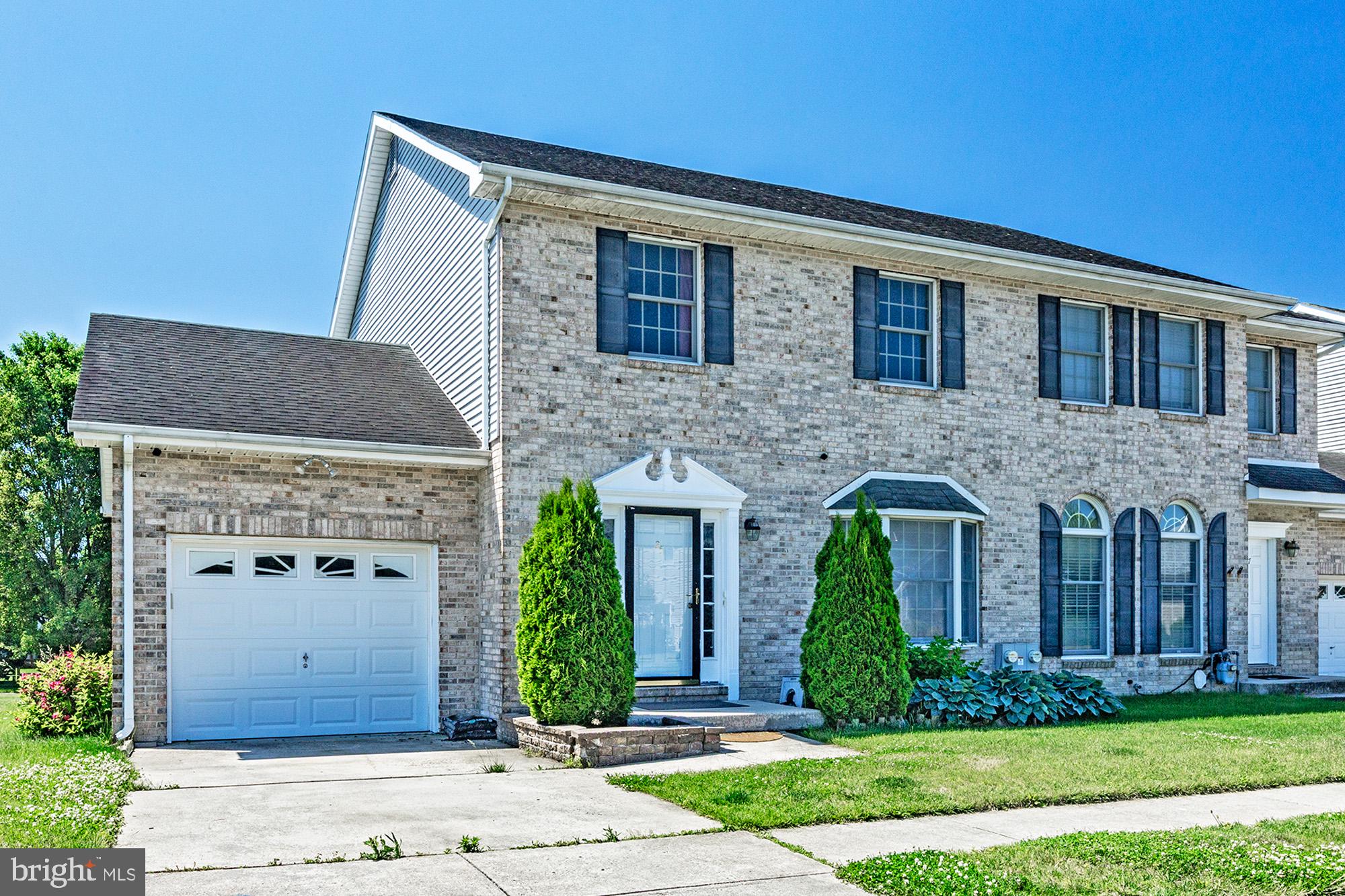 Welcome to this attractive brick two-story end-unit townhome in the highly desirable Mansion Farms community. This premium corner lot backs directly to parkland and community open space, offering privacy and beautiful views. With approximately 1,800 sq. ft. of finished living space plus a spacious basement, this bright home features a wide-open floor plan with 9-foot ceilings on the main level — perfect for modern living and entertaining.

The main level includes a tiled foyer with oversized coat closet that flows into a spacious living room with a cozy fireplace, recessed lighting, and a bright bay window. It opens seamlessly to an enormous kitchen featuring 42” cabinets, ample counter space, room for a large island with bar seating, a full-size pantry, and a dining area with walk-out access to a bigger deck overlooking the rear yard. A powder room and convenient walk-in laundry closet are also on this level. The one-car attached garage makes carrying groceries easy, and extra guest parking is readily available throughout the community.

Upstairs, the owner’s suite offers vaulted ceilings, a large walk-in closet, and a luxurious bathroom with corner soaking tub, dual sinks, and walk-in shower. Two additional generously sized bedrooms with lighted ceiling fans and excellent closet space complete the upper level, served by a full hall bath.

The basement adds valuable living space and includes a dedicated office room ideal for remote work, plus a projector and screen already in place for fantastic home theater viewing. 

This home has been updated with peace of mind in mind: a brand-new HVAC system and upgraded appliances, both with extended insurance coverage, plus a security system with four cameras.

Located in the highly rated Appoquinimink School District with easy access to Rt. 1, I-95, Rt. 40, and Rt. 896. Enjoy nearby Lums Pond State Park, Glasgow Park, University of Delaware, and shopping at People’s Plaza.

This move-in-ready end-unit townhome combines privacy, spacious living, a bigger deck, a versatile basement with office and home theater setup, strong warranties, and an unbeatable location. Schedule your tour today!