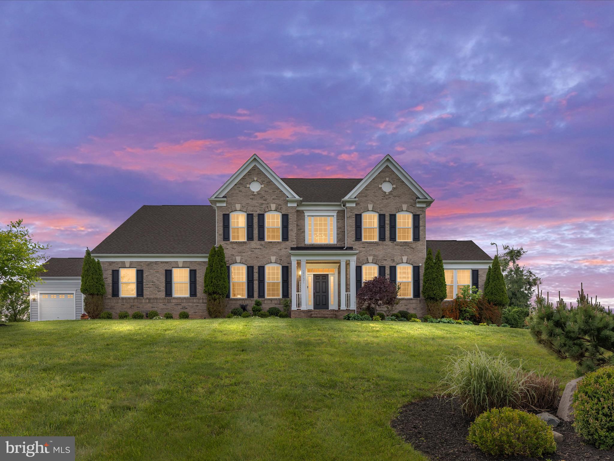 Luxury, Technology & Timeless Design in Huntleigh at Creighton Farms

Welcome to this extraordinary 5-bedroom, 4.5-bath custom estate, perfectly positioned on a private 3.26-acre lot in the prestigious community of Huntleigh at Creighton Farms. With over 7,300 square feet of refined living space and over $450,000 in premium upgrades, this home offers a rare fusion of sophistication, comfort, and state-of-the-art technology.

The heart of the home is a professionally designed chef's kitchen featuring top-of-the-line Thermador appliances, including a built-in wall oven, microwave,  warming drawer, gas range/oven, and two dishwashers. Custom cabinetry with LED lighting adds a sleek, modern edge, while the expansive layout is ideal for everyday living and entertaining on a grand scale.

Elegant Brazilian cherry hardwood floors flow throughout the upper and main levels, where you'll also find a spacious home office and private guest suite with a full bath, which are perfect for multigenerational living or hosting. Whole-house audio, Nest automation, network wiring, and a full intercom system provide seamless smart living, central vacuum, security alarm, surveillance system, two Tesla EV chargers, and a whole-house generator deliver next-level comfort and peace of mind.

Step outdoors to a stunning backyard retreat featuring a custom patio, built-in grill, fire pit, professional landscape lighting, and ample space to relax or entertain. The widened driveway leads to four smart garage doors, two of which are fully insulated and finished with custom flooring.

This is more than just a home; it's a lifestyle statement in one of Northern Virginia's most coveted communities, where luxury, privacy, and cutting-edge features converge. Don't miss your opportunity to schedule a private tour today!