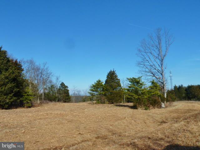 If you are in search of the perfect building lot that provides seclusion, yet has easy access with state maintained roads nearby, You've found it! Tremendous views of the Signal Knob Mountain are found from various lots! Lot 40 is the Perfect Dream Home Lot for the commuter looking to escape from the hustle of the city! Whether you want a House-on-the-Hillside surrounded by trees for seclusion, or we have lots located close to the Private Common Use area for Lake Access, we have exactly what you're looking for!  Don't wait we Only have 3 lots remaining out of 41!