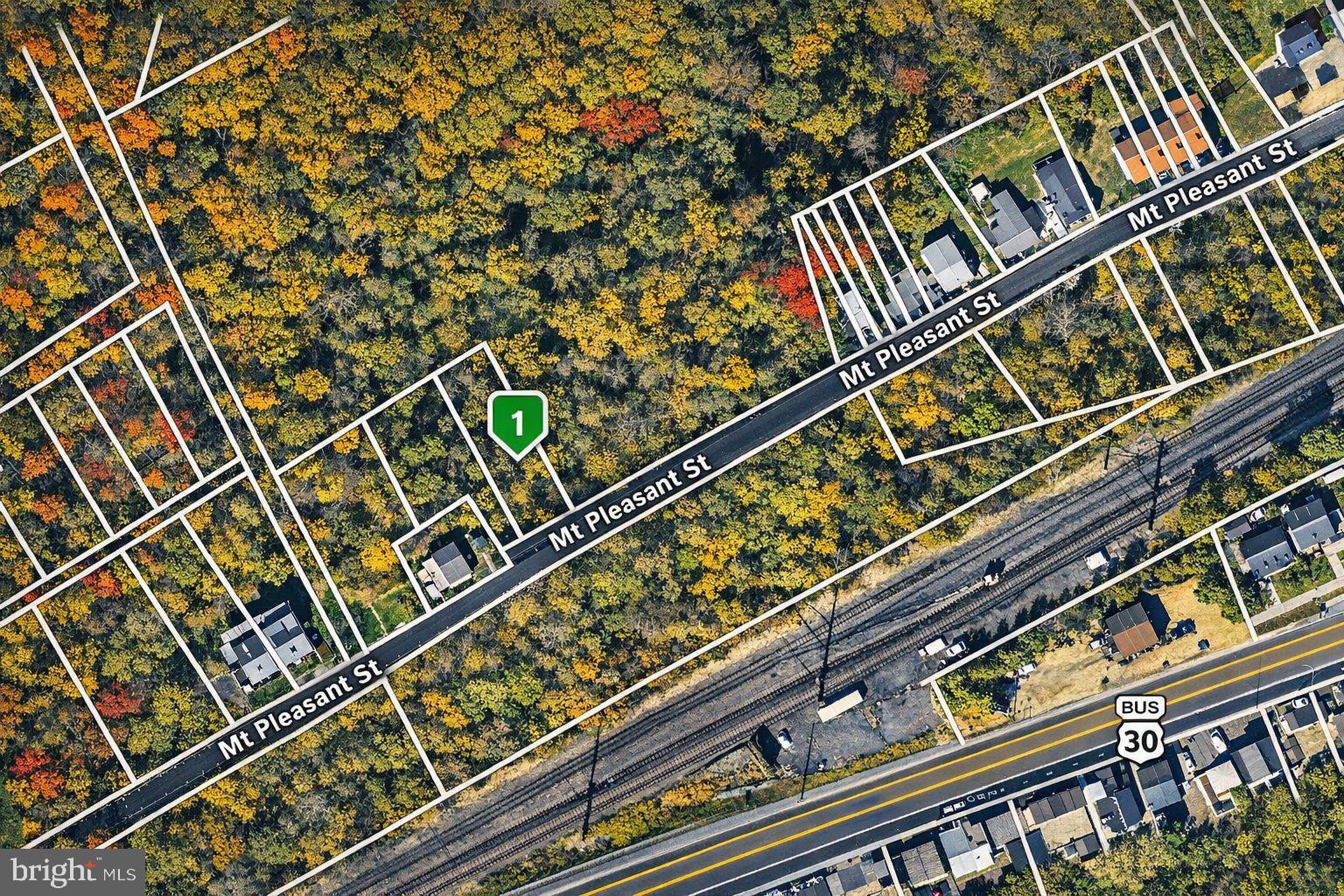 Affordable building lot located on a quiet cul‑de‑sac near the Valley Township border, outside downtown Coatesville City. This well‑positioned property offers flexible RN‑5 zoning, allowing for a variety of residential development options including single‑family detached homes, semi‑detached twins, townhomes, and multiplex units, subject to required municipal approvals.
Public water and sewer are available in the street, helping to streamline future development. Some engineering work has already been completed, providing a head start for builders or investors—remaining approvals are required prior to construction. The lot has been pinned and is surrounded by newer townhome development nearby, underscoring the area’s continued growth and demand.
Owner will consider selling this lot individually or in combination with other nearby lots listed separately, offering scale and flexibility for larger development concepts. A rare opportunity for builders, developers, or end‑users seeking a quiet setting with strong residential potential and multiple permitted use paths.
Buyer and buyer’s agent are responsible for verifying zoning, permitted uses, density, utilities, boundaries, and all development requirements with the appropriate municipality. Property is being sold as‑is.