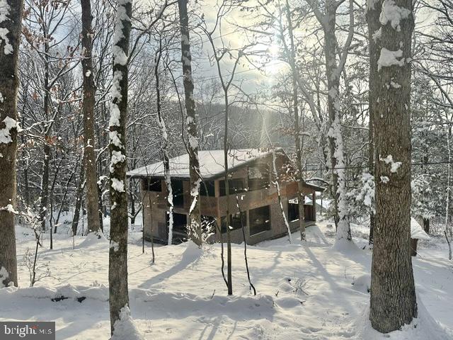 Beautiful wooded 1.27 Acre lot in the Kutztown school district. Tucked away on a slight hill this property feels private.  This home is ready for your completion to create a space completely to your tastes. Along with the newer metal roof, 200amp electric service, pegged oak posts, there are remnants of past dwellings where a bank barn used to be as well as a 70' long stone retaining wall.  A local builder had started the process of rebuilding off an existing property using locally sourced materials. There are too many intricacies to this rebuild to mention but the Seller has supplied a detailed description upon requests.