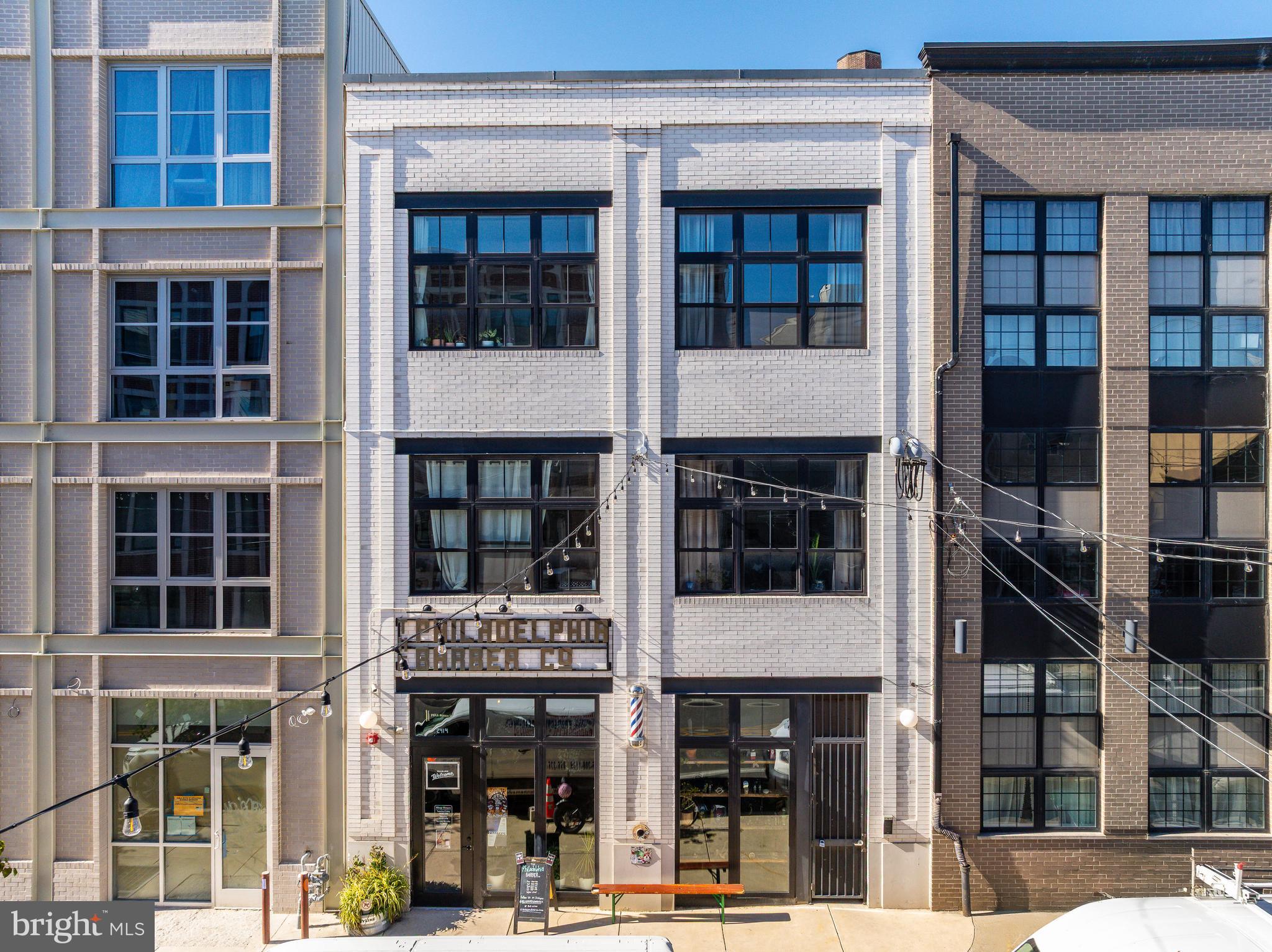 Introducing 2414 Frankford Avenue — a turnkey 7-unit investment property, prominently located with 29' feet of prime frontage on one of Philly's most recognizable streets — Frankford Avenue Fishtown. This fully-leased boutique apartment property features six (6) apartments over ground floor commercial space. The ±5900 SF, 3-storey building is comprised of two (2) bi-level 2bd x 2ba units and four (4) 1bd x 1ba units atop 796 SF of prime commercial space, leased to Philadelphia Barber Co. Designed by Canno, the curb appeal emanates along the Frankford Ave corridor — surrounded by some of the city's best restaurants, retailers, cafes and bars.  Factory styled oversized windows emit an overflow of natural light in the apartments coupled with slick kitchens and baths, European-inspired finishes, high ceilings, and laundry and storage for convenience. Purchase this irreplaceable multifamily building in a Top-10 USA MSA — the #1 destination to visit in 2026 — where extremely high barriers-to-entry exist. 2414 Frankford boasts a completely walkable setting in Fishtown proper, with an abundance of amenities and conveniences available within a short stroll, such as: The Market-Frankford El train, Shake Shack, La Colombe, Kalaya, Forin, Suraya, LMNO, Goldie, City Fitness, Front Street Cafe, Middle Child Clubhouse, Laser Wolf, Wm. Mulherin's Sons, Pizzeria Beddia, Palmer Park, and more. Fishtown has become a locally-prized destination for top chefs, retailers and creators — and tenants alike. There is no shortage of residential demand in this coveted submarket. There are limited opportunities to invest in high-quality real estate in Fishtown due to its scarcity. High-growth rental submarket. 10yr tax abatement. Minimal OPEX. Enquire within for financials.