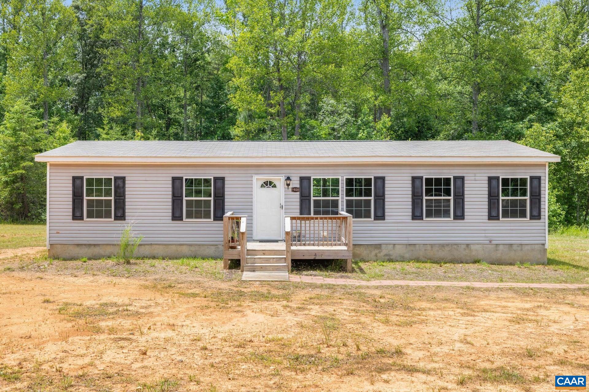 Nearly New Country Retreat on 4.9 Acres with Loads of Privacy! Conveniently located near Route 64 between Richmond & Charlottesville. This move-in ready home offers the perfect blend of privacy, convenience & modern living. Nestled on a wooded 4.9-acre parcel, there?s plenty of room to roam, garden, play, or simply enjoy the peaceful surroundings. Inside, you?ll find over 1400 finished square feet of bright, inviting living space featuring durable luxury vinyl plank flooring thru-out the main areas, neutral finishes & an open-concept layout designed for everyday living & entertaining. The spacious living room flows seamlessly into the large eat-in kitchen, complete with abundant cabinetry, a pantry, generous counter space, stainless steel appliances & a center island perfect for gathering with family & friends. The split-bedroom design offers added privacy, with a spacious primary suite featuring a large walk-in closet, double vanity & walk-in shower. Numerous windows thru-out fill the home with natural light & showcase the surrounding country views. The guest bedrooms are generously sized, and the living room features an attractive accent wall. Turn-key, nearly new, and full of potential?this home is ready for its next owner!,Maple Cabinets