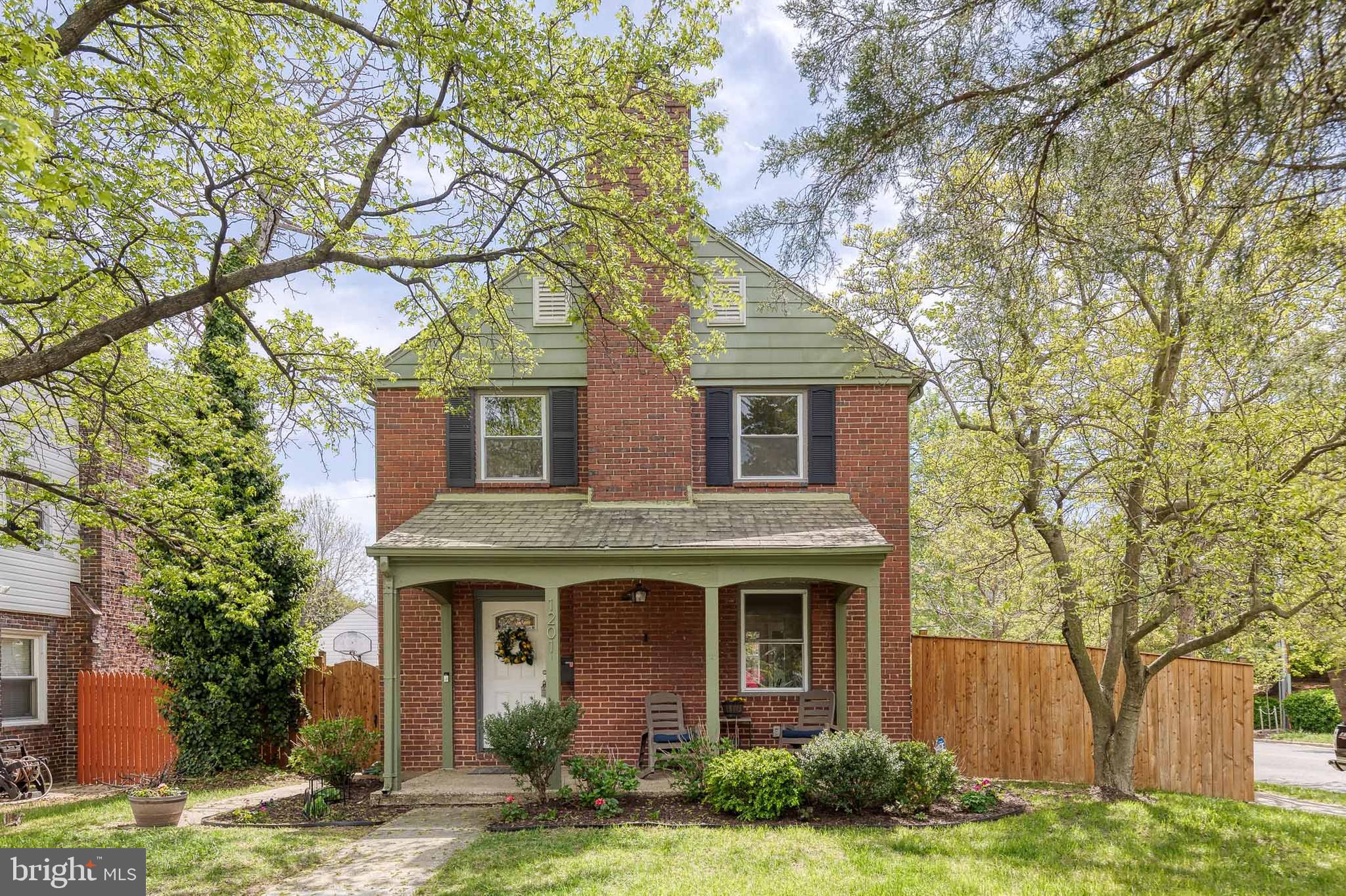 OFFER DEADLINE SET FOR MONDAY 4/28 at 12PM. This charming red-brick home in Ednor Gardens offers 3 bedrooms, 2.5 baths, and sits on a generous corner lot, beautifully enclosed by a newer 6-foot cedar privacy fence. A picturesque covered front porch and distinctive slate roof add to the home's curb appeal and character. Inside, you’ll be greeted by a spacious living room featuring original hardwood floors and a cozy wood-burning fireplace (currently sealed, but easily convertible back into working order). High ceilings and large windows enhance the 1930s charm, allowing natural light to fill the space. The living room flows seamlessly into the eat-in kitchen, complete with a breakfast bar for added convenience. The updated kitchen boasts stainless steel appliances, including a brand new oven installed in 2025. The main level also includes a laundry area and a convenient half bath for guests. Upstairs, the hardwood floors continue through all three bedrooms, with a full bath featuring a tub and shower accessible from the hallway. In 2023, the basement was fully waterproofed and updated, offering great potential for additional living space or a rental unit. It includes a full bathroom with a shower stall, laundry hookup, a legal egress window, and new flooring. The backyard is a private retreat with lush landscaping and a charming brick patio, perfect for outdoor entertaining. The home also features a driveway and a detached garage with electricity, providing space for one car. Ideal for runners, walkers, and park enthusiasts, the home is just a 15-minute stroll from Montebello Lake and neighboring Herring Run Park. The Weinberg Y, with a childcare center and pre-K, is nearby, and two bus lines are just a block away. Enjoy easy access to local entertainment, art, farmers markets, and activities. Conveniently located within a 10-minute drive to Johns Hopkins University, Morgan State University, Loyola University, Notre Dame College, Clifton Park Golf Course, and more!
