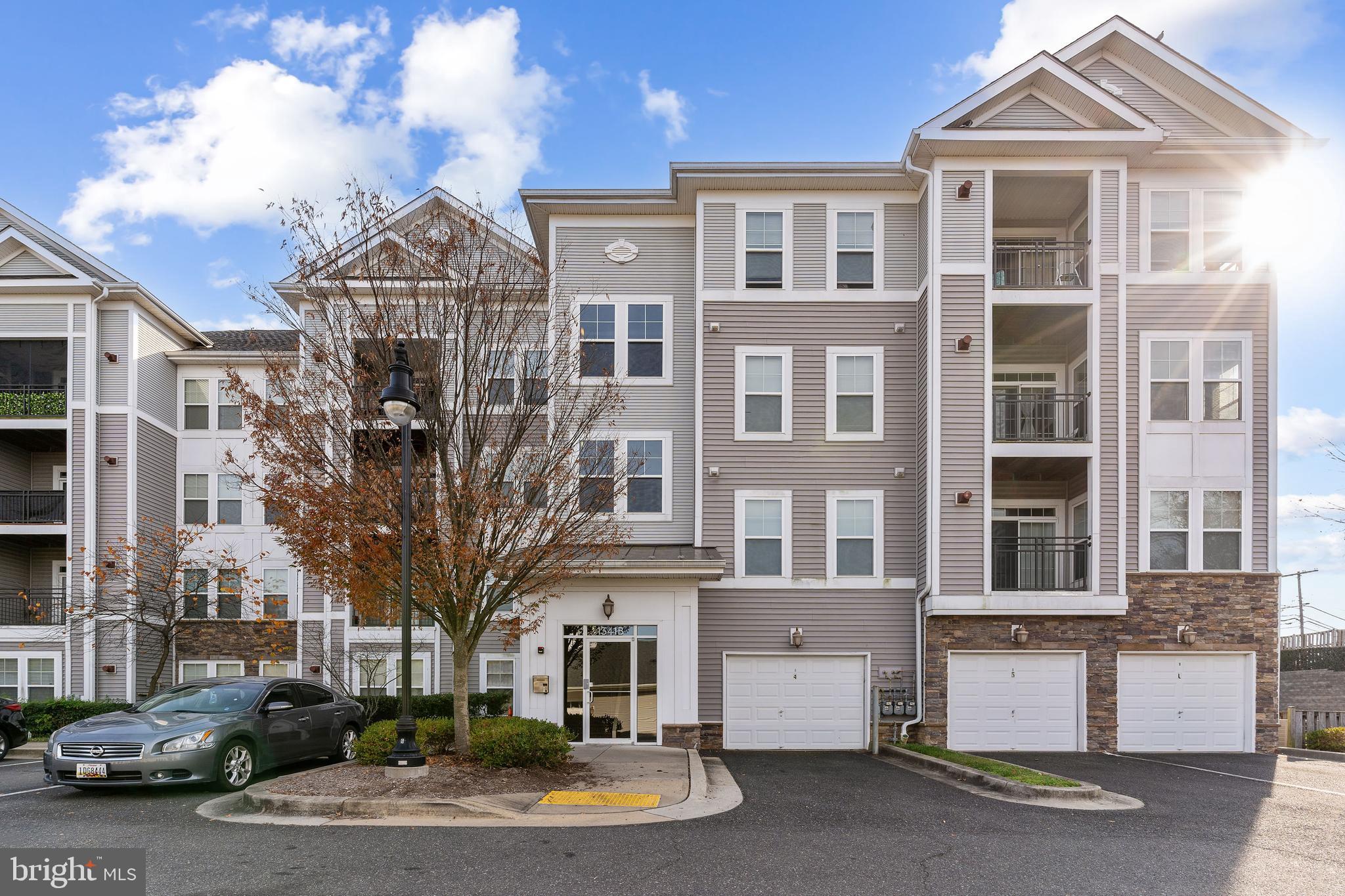 ***BACK ON THE MARKET, BUYER COLD FEET***    This charming condo, nestled within the gated community of St. Paul Addison includes a private covered balcony offers 2 bedroom, 1 full bath with spacious & open concept design. Ample space for living and entertaining with an open flow from the kitchen to the living and dining areas. The kitchen with a pantry features cherry wood cabinets, elegant granite counter tops and stainless steel appliances including gas cooking.  Enjoy St Paul Addison amenities, including a fitness studio, party room with kitchen, and ample parking.