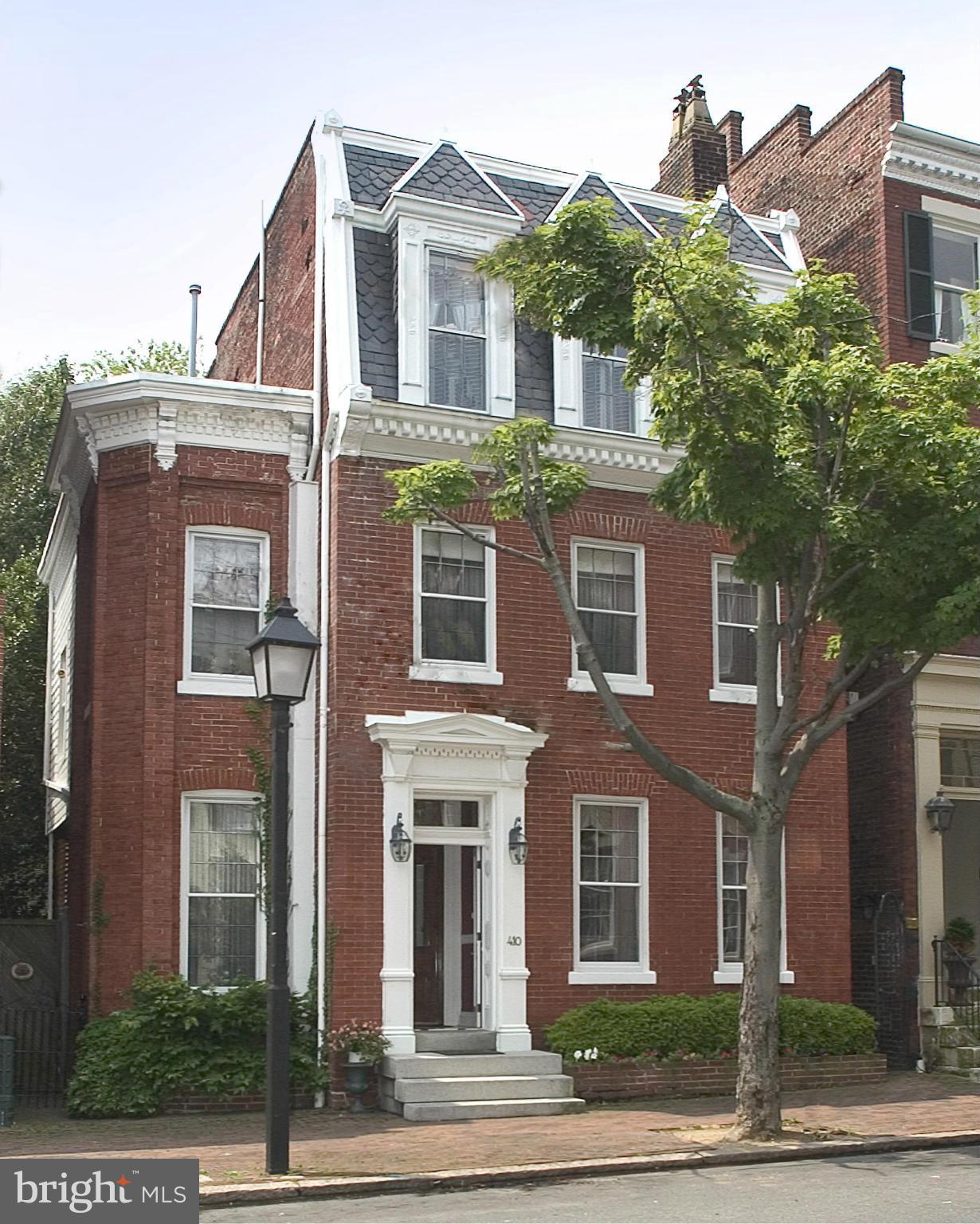 Stunning detached historic home. Quality renovation included almost every detail.  All rooms spacious, w K/ FR, breakfast rm, formal LR & DR rms, truly a chef's kitchen w AGA range, honed granite & "Custom Cabinetry". Nine+ ft ceilings all floors, including top & basement levels. All HW fls, stain glass window transoms, Victorian skylight & beautiful outdoor space, OS/1car.  Definitely a 10+.