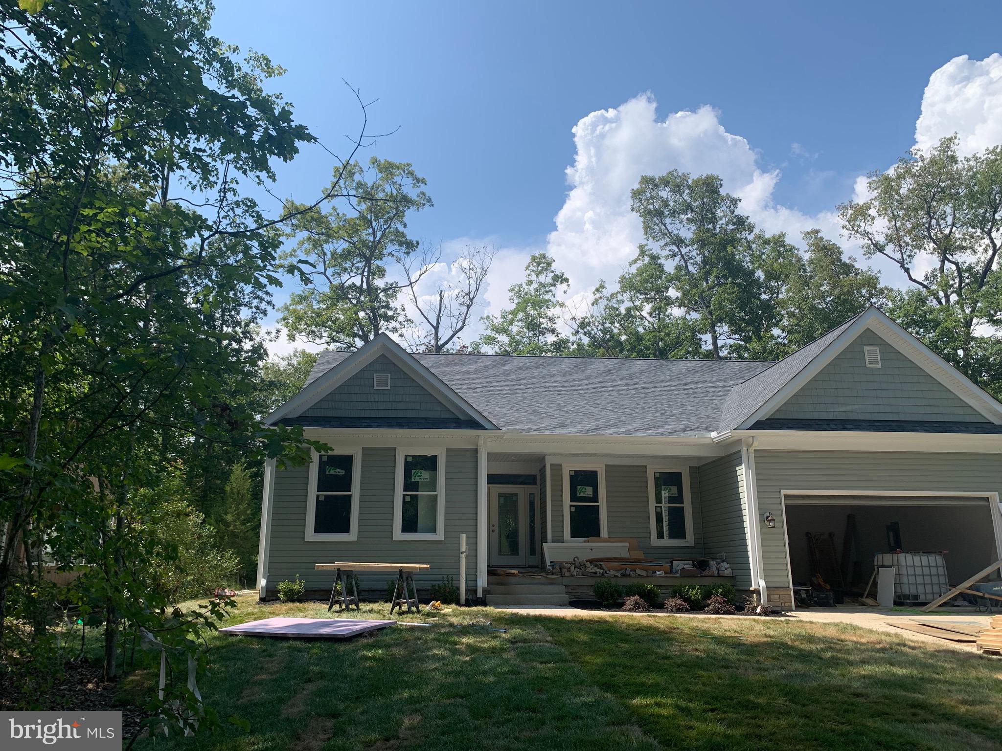 Construction almost done ,just few more touches and final clean this weekend  4 Bedrooms and 3 full Bathrooms 2440 SQF One Level with Conditioned Crawls space ,Quartz Countertops SS Appliances, breakfast bar, gas fireplace Stove & hook up for the grill, Led lights, Master with Separate soaking tub &shower.Huge Walk I n Closet Alarm & Surround System,Sky Door bell with Camera Brazilian oak Hardwood floors,Pull dawn stairs for attic and the list keeps on going on . Worth  to stop by and take a look