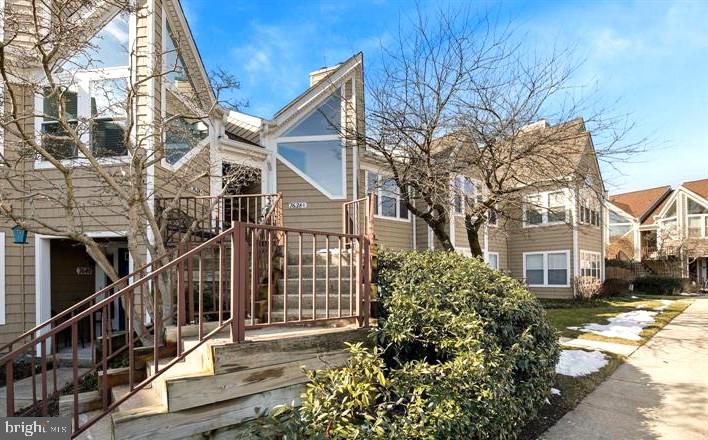 Fantastic upper-level condo featuring a spacious second-floor loft and an open, flowing floor plan filled with natural light. This well-maintained home offers generous room sizes, 2.5 baths, a bright living room with a cozy wood-burning fireplace, and a dining area perfect for everyday living and entertaining.

The kitchen features a breakfast bar, custom backsplash, and all appliances convey, including the washer and dryer. The spacious primary suite includes a full bath with a soaking tub and decorative stone accent wall. Recent new carpet, fresh paint, HVAC replaced in 2016, New window 2023. and updated siding and roof.

Enjoy outdoor relaxation on the private patio and the convenience of included window treatments. Ideally located near Routes 100, 95, 295, 29, and 32, providing easy access to Fort Meade, NSA, Baltimore, and Washington, D.C.

Perfect for first-time buyers, downsizers, or anyone seeking a low-maintenance lifestyle in a highly convenient location. Location, Location, Location!