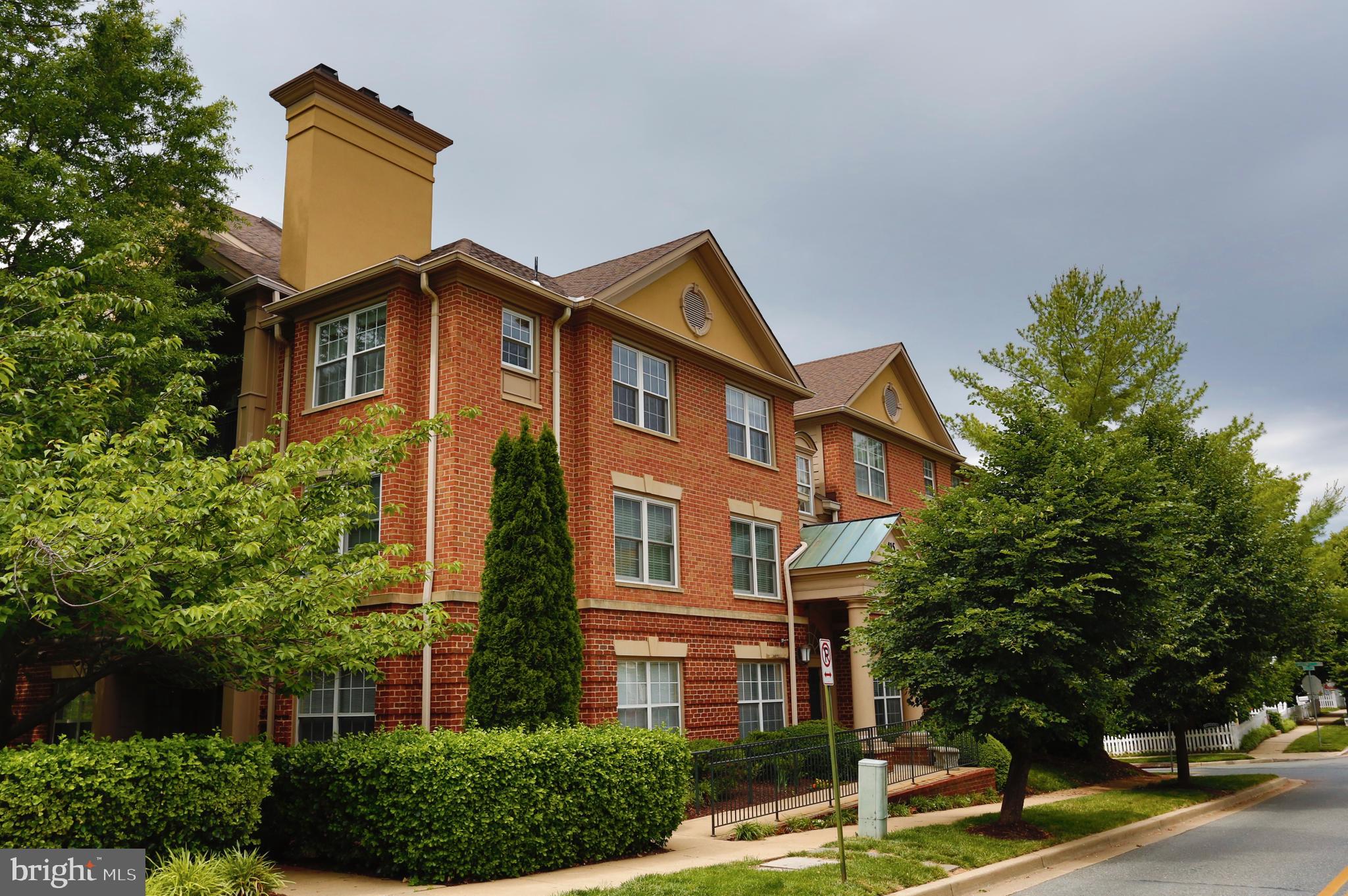 Rare and desirable  2 BR/2FB with upper loft condo. Spacious (almost 1500 sq ft) and bright corner unit with hight ceilings and  all new windows and new sliding doors (2019) to a private balcony with a nice view  in the very beautiful  part of Kentlands.  Recess lighting in living and dining rooms installed in 2017 . Charming kitchen with granite countertops and  nice appliances remodeled in 2017.  Hardwood floors , wood-burning fireplace, washer/dryer , walking closet in master and plenty of storage space. Secure building entrance. Close to shopping, dining, entertainment and commuter routes. Very nice place to call your next home!