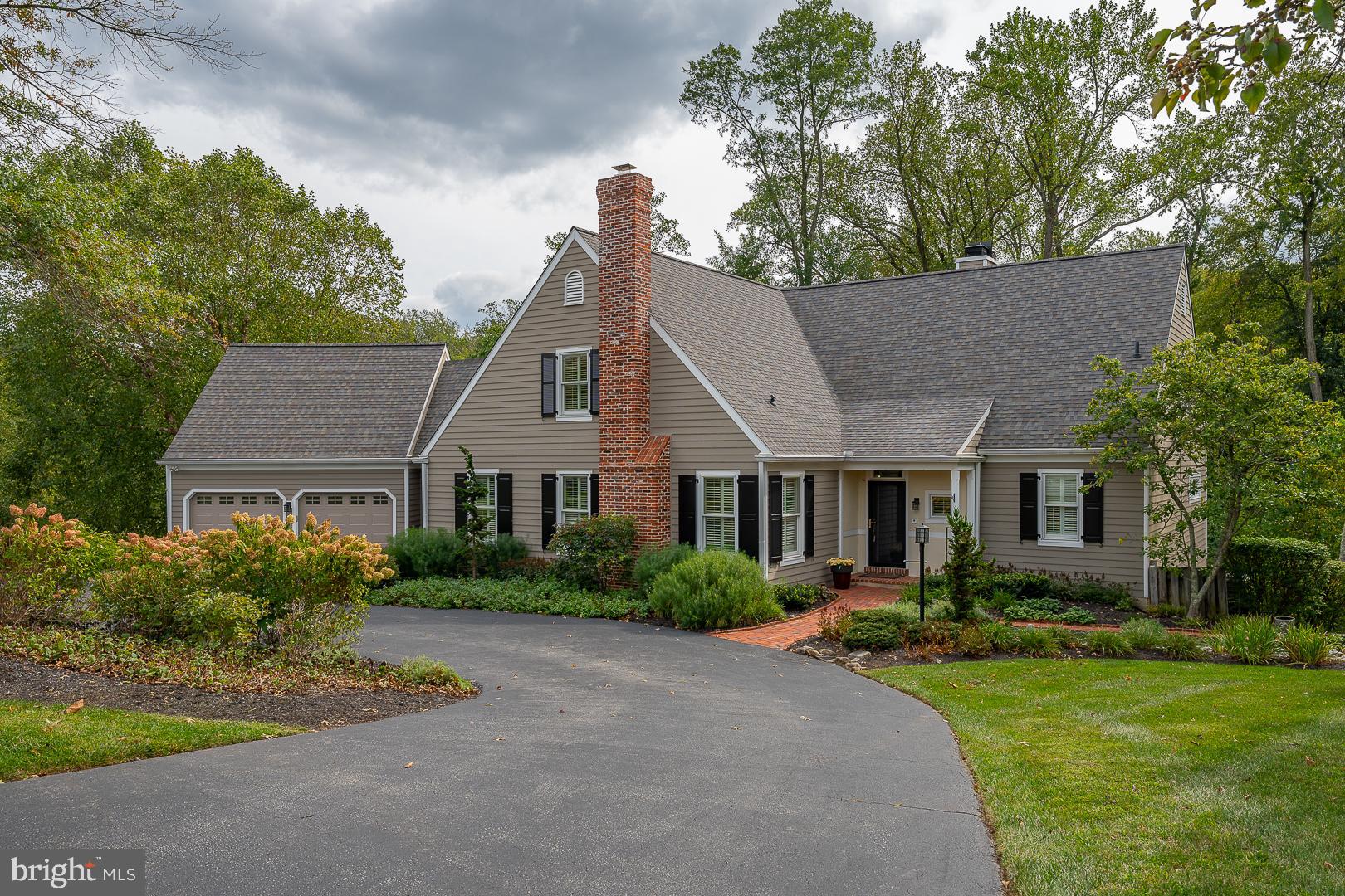 This beautiful Cape-style home, built by the renowned BJ Drueding, is situated on a private lot at the end of a cul-de-sac of the highly desired Sunwood Farm and went through extended renovation in 2023. 
 This exquisite home is in truly fabulous condition. 
While the front of the house with its beautiful landscape and timeless architecture immediately attracts you, the back will offer breathtaking views of trees and of a small stream in all four seasons. 
This is a truly one-of-a-kind property: an over 4,000 sqft home in pristine condition that feels charming and cozy and sits in a very special secluded wonderland.
The first floor presents an elegant foyer that provides access to the living room, the family room, the kitchen, the new powder room, and the hallway that leads to the primary bedroom suite.
The spacious Living Room with crown molding, low-cased windows, and a wood-burning fireplace, opens to the formal Dining Room creating a perfect space for large indoor gatherings. The Great Room with its soaring vaulted ceiling, fireplace, built-ins, and window seat, is filled with natural light from its extensive banks of windows and has access to the large deck overlooking the enchanting backyard, and to the kitchen dining area, and the kitchen, for a great full of light open floor feeling. The beautiful new gourmet white kitchen is adjacent to a mud/ laundry room offering an extra refrigerator, a generous pantry closet, extra cabinet space, and doors to the driveway, to the expansive deck in the rear, and to the oversized two-car garage. 
 The pleasant primary suite offers a generously proportioned bedroom with great views, plenty of closet space, and a brand-new bath with double sinks, a shower, and a soaking bathtub.
The second floor features 4 additional generously sized rooms. Three rooms are used as bedrooms, the fourth one has been used as a great second-floor TV Room/Office. Two of the bedrooms are accessed from the 2nd-floor balcony overlooking the great room and share the new hall bath. The third bedroom (above the garage) with its en-suite bath, is accessed through the TV Room.
The incredible walk-out lower level presents a generous corner room with a fireplace, plenty of windows, and doors to an adjacent cozy office, to the lower level deck, and to a large game/recreational room/working office with an annexed powder room that could be easily converted into a full bath transforming this floor into a perfect guest’s suite. The remaining unfinished portion of this level offers an abundance of storage space and another exit to the deck. Last but not least, a set of stairs leads to a very large room one floor below, a room with a large sliding door to the backyard that has been used as a gym. 
 All the decks are linked together creating perfect outdoor flow and offering unparalleled outdoor living spaces. 
 Everything was thought out in great detail, from the walk-in cedar closet on the second floor to the closet on one of the decks to easily store outdoor furniture.
The kitchen, the primary bath, the powder room, and the 2nd-floor hall bath were redone in 2023. The hardwood floors had just been refinished, most of the carpeting was replaced and most of the walls had been freshly painted. The lower-level stucco was replaced/repaired in 2023 (post-work independent inspection is available and the work came with a 10-year transferable warranty). 
 The Sunwood Farm Community has an incredible location.  It is a short distance to the Valley Forge National Park and the charming town of Phoenixville. King of Prussia with its endless dining and shopping options and Paoli with its train station (offering Septa and Amtrak service) are in close proximity. Mayor highways and hospitals are also at a very convenient distance.