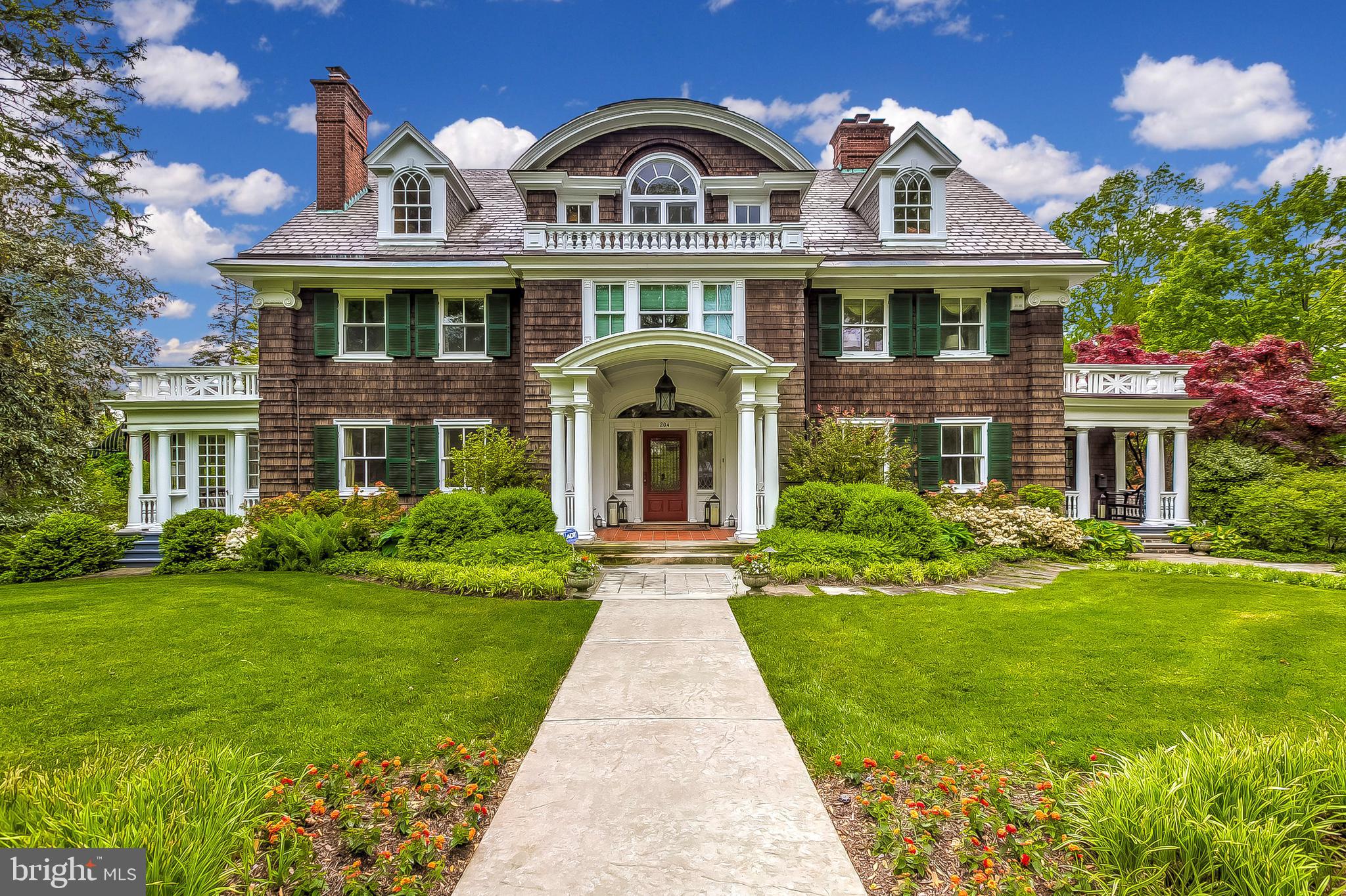 Architecturally significant and magnificently renovated home curated with meticulous attention paid to every detail.  Exquisitely updated 6 bedroom, 4 full and 2 half bath home located on one of Roland Park's finest streets. Throughout the more than 8,500 square feet of elegant living areas, you will be charmed by the high levels of finish and refined appointments in every level of the home.  204 Ridgewood Road showcases classical proportions and master craftsmanship in true Roland Park style.   You are welcomed by the grand foyer graced by a sweeping staircase awash in light from multiple, gorgeous leaded glass windows. The foyer is flanked by beautifully proportioned living and dining areas all graciously flowing into one another and making this sophisticated home incredibly wonderful for entertaining. You'll love the newly renovated screened porch, which perfectly complements the interior and is ideal for enjoying outdoor living while taking in the home's beautiful landscape. In addition, there are Sonos and Lutron systems throughout all levels of the home, as well as Sonos for the exterior.   The gourmet kitchen has been completely updated to include heated floors, granite countertops, Sub Zero and Wolf stainless steel appliances, newly painted cabinets and a desk area. The room is so spacious and wonderful for gathering and more casual dining. Also offering all the modern features and amenities desired by today's chefs. In addition, an adjacent mudroom was incorporated from an original side porch creating a convenient entry into the home along with additional storage.  Ascend the gorgeous staircase and you'll fall in love with the private, remodeled master suite with spacious den, his and hers walk-in closets, and a large fully remodeled bath.  Two additional bedrooms, one with a remodeled, conditioned summer porch, and another beautifully designed full bath complete the second level. The spacious and bright third level offers three additional versatile bedrooms, one which is designed as a custom bunk bedroom, and the others could also serve as family rooms, guest quarters or large offices.  You'll appreciate the versatility and spaciousness of the second and third levels of the home.  An exceptional lower level recreation room is a wonderful surprise and the ultimate space for more casual entertaining.  Warm and inviting and offering a billiard and media room, a full bar, a new 850 bottle wine cellar and spacious, updated laundry room. This incredible recreational area won a design award in 2012 for its truly inspired design. You'll be drawn in by the warmth of this space, and will want to gather with family and friends in one of the most inviting spaces imaginable.  You'll fall in love with the beauty of the fully landscaped property designed by Bob Jackson Landscape Architects. Sited on almost an acre of sweeping lawns and fine gardens of mature plantings and trees, you are ensconced in a lovely and private oasis. Featuring large blue stone patios, stone terraced walls, a custom fire pit, outdoor lighting and speakers creating an idyllic outdoor living experience. Imagine evenings under the stars around the fire pit or larger gatherings on the beautiful stone patios and gorgeous screened porch.