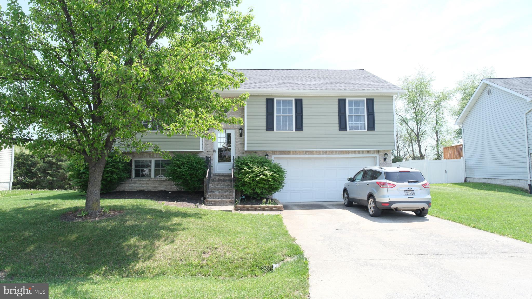 BEST AND FINAL OFFERS DUE BY SUNDAY, MAY 4, 7:00pm
Welcome to 210 Ford Circle, a split foyer home situated in the desirable Inwood Meadows neighborhood. Built in 2004, this residence offers 3 bedrooms, 2 full bathrooms, and 1,396 sq ft of comfortable living space. Conveniently located near shopping, dining, and major commuter routes, this home combines modern amenities with a welcoming atmosphere.​

Key Features:
Spacious Living Areas: The open-concept main level features a bright family room with a gas fireplace, perfect for cozy evenings.

Functional Kitchen & Dining: The kitchen offers ample counter space and cabinetry, complemented by a generous eating area, making meal preparation and dining a pleasure.​

Primary Suite Retreat: The primary bedroom boasts a walk-in closet and a private bath, providing a peaceful retreat.​

Unfinished Basement: The partial, unfinished basement presents potential for additional living space or storage, limited only by your imagination.​

Two-Car Garage: The deep two-car garage is equipped with a propane wall heater and sink, ideal for projects and additional storage.​

Outdoor Living: Enjoy outdoor activities in the fenced backyard, featuring a freshly stained deck, lower concrete patio, and a storage shed for added convenience.​

This home offers a blend of comfort, functionality, and style, making it an excellent choice for those seeking a move-in-ready property in a vibrant community.