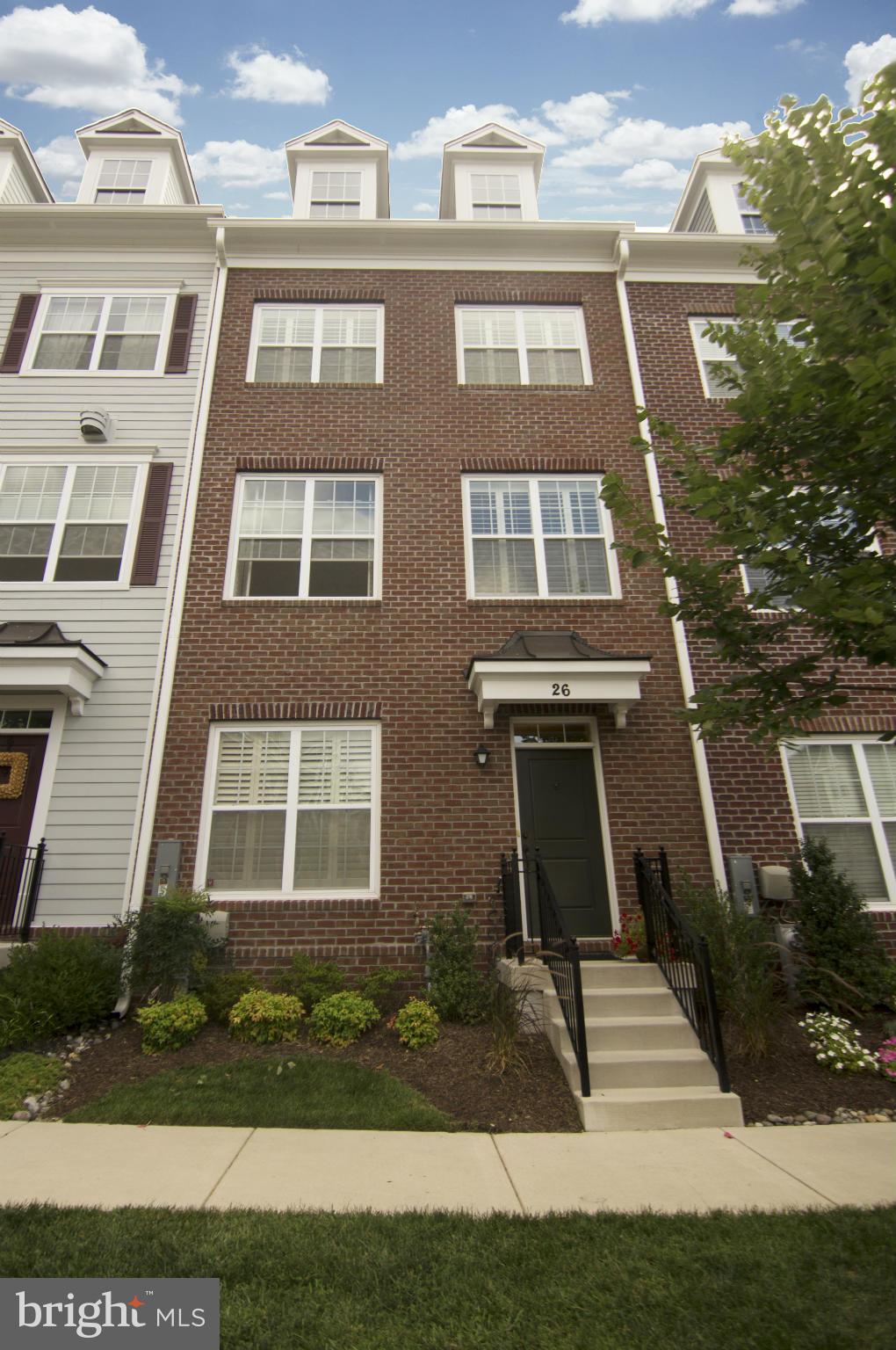 Sorry- NO VOUCHERS. Nearly new townhome in Towson Green in mint condition. Wood floors on entry and main level. 3 brs w/upgraded carpet, 2 bathrooms on top level. 2 car garage. Plantation shutters throughout. French doors to large family room on entry level. Eat-in kitchen w/quartz countertops, stainless steel. Huge open living/dining area. Private porch off kitchen. Walk to everything Towson.