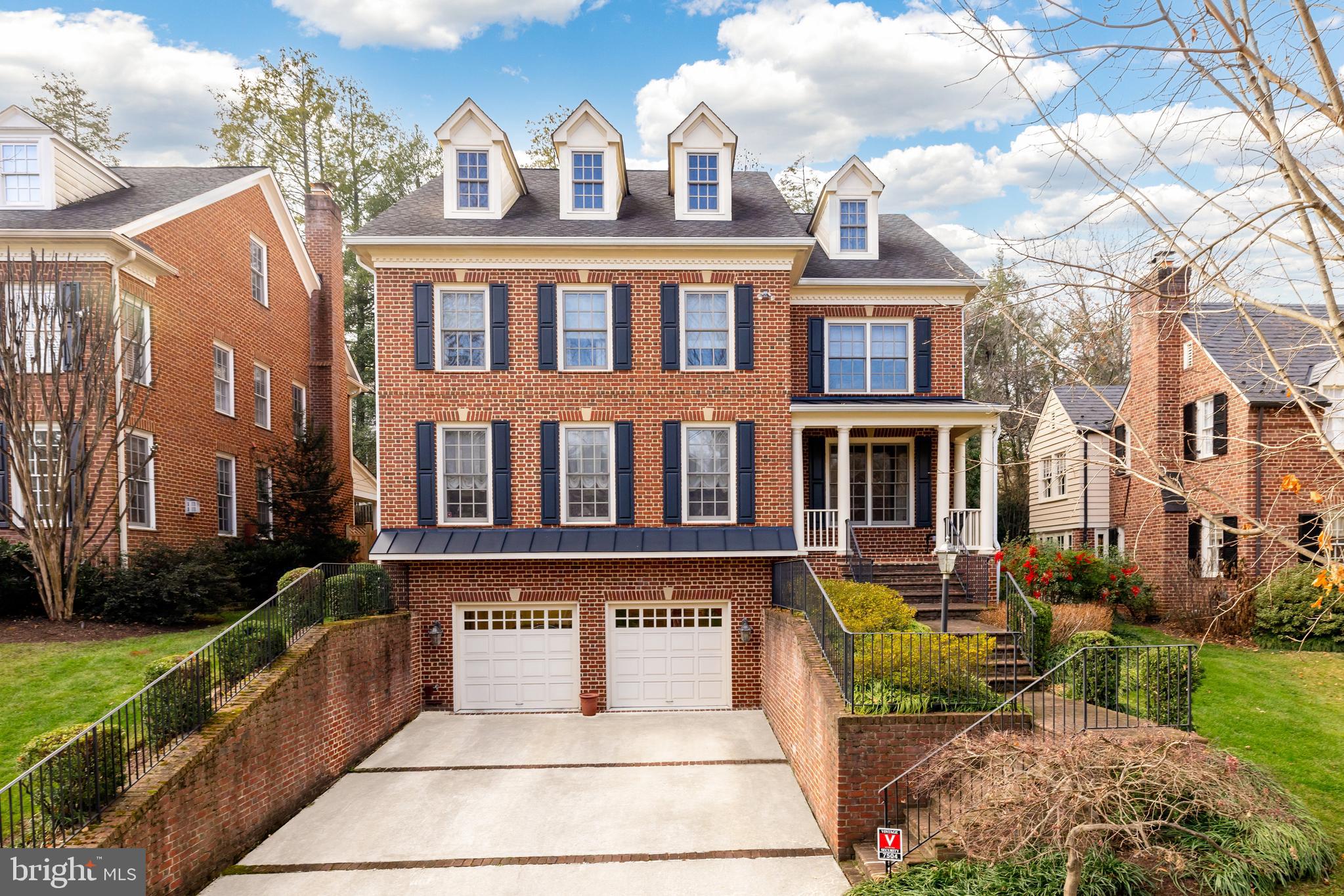 Gracing the beloved Chevy Chase neighborhood, 7504 Glendale Road can’t help but catch the eye of all who pass by, showcasing admirable, traditional craftsmanship in addition to modern amenities. The 2004 Colonial offers six bedrooms and five and one-half baths across four elegantly curated levels, offering crown molding, chair railings, hardwood floors and ceiling fans throughout 5,600 square feet. 

Both the spacious driveway and charming walkway guide residents to the covered porch overlooking the main street; enjoy your morning coffee and say hello to the neighbors from this coveted spot! The foyer, complete with a sizable window and window seat, radiates light and poise and flanks the dining room and living room. The living room, complete with a gas fireplace, creates an effortlessly comforting atmosphere to relax. The study closely follows, boasting stunning built-ins and sizable windows; unlock new ideas or find clarity and focus in this private space. The dining room is flooded with natural light, contributing to the ultimate formal dining experience. The eat-In, gourmet kitchen offers updated appliances and plentiful cabinetry – sure to marvel any at home chef! The breakfast room follows, offering sizable windows and space. The family room offers stunning built-ins and a gas fireplace; and offers access to the covered porch and patio. The main level is complete with a powder room.

Ascending to the upper level, the primary bedroom awaits, offering tray ceilings, a ceiling fan, two walk-In closets, an ensuite additional bedroom or sitting room and an ensuite full bath. The spa-like primary bath showcases two vanities, a soaking tub and stall shower; unwind and lean into relaxation in this soothing oasis. This level is complete with two additional bedrooms, both complete with ensuite full baths, and a laundry room. Ascending to the third level, a sizable bonus room allows residents to dedicate space to their crafts or passions; from a workout room to a studio, the decision is yours! This level is complete with a fourth bedroom that offers a walk-In closet, a full bath and attic storage. 

Descending to the lower level, the recreation room makes hosting a dream come true with generous space and high ceilings. The level is complete with a sixth bedroom, a full bath, a storage and utility room, and access to the two-car garage. 

The rear yard includes a covered porch leading to the stone patio overlooking the manicured rear lawn; enjoy al fresco dining or host the annual summer barbecue in this idyllic, private oasis!

Just outside of D.C. and within close proximity to the new Chevy Chase Lake Center, the Bethesda Metro, the Beltway and commuter roadways, 7504 Glendale offers a prime location in addition to the opportunity to create lasting memories in this remarkable residence!