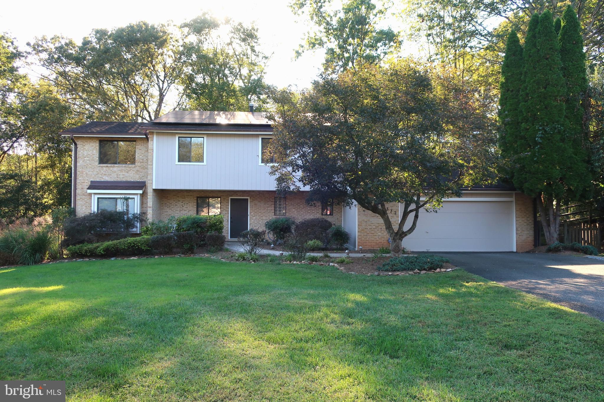Beautiful cul-de-sac home in the quiet Colvin Glen neighborhood, overlooking Colvin Run with scenic, park-like views throughout. This exceptional property offers 5 bedrooms and 4 fully renovated bathrooms, set on a half-acre lot with perennial gardens and direct access to county trails and expansive parkland. The light-filled interior features a great room with vaulted ceilings and a gourmet eat-in kitchen with a large center island, Viking gas cooktop, granite countertops, and natural cherry cabinetry. A flagstone walkway leads to the front entrance, and a spacious deck overlooks the backyard. The daylight lower level provides comfortable living space with a bedroom and full bath. All bathrooms have been fully renovated with high-quality finishes. Fully owned solar panels, installed in 2019, offset up to 90 percent of electricity costs. Ideally located near Tysons with dining, shopping, and entertainment, and served by top-rated schools. Immaculate and move-in ready.  (Professional pictures and 3D will be available on or before 10/17.)