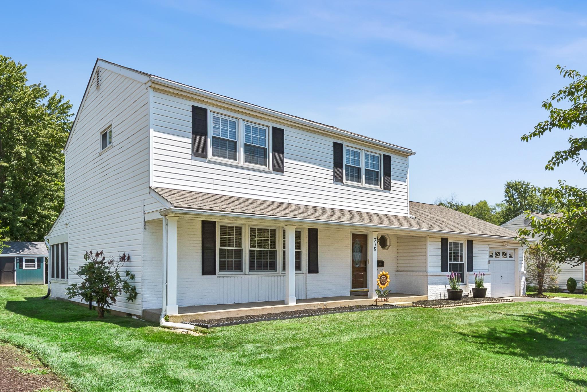 Welcome to 275 Waverly Road, an alluring 4-bedroom, 1.5 bath oasis, in a beautifully picturesque portion of Burgundy Hills, in Southampton.  A wonderful brick face, center hall colonial with great flow and updated finishes, this home has it's share of charming features and stylish updates.  The sleek, modern kitchen with stainless appliances, granite counters and classic subway tile backsplash flows effortlessly to the formal dining room with warm accents.  The recently renovated family room with brick veneer is both modern and rustic and provides the perfect setting for relaxing evenings and entertaining.  Additional features include lovely hardwood flooring throughout the main level and remodeled first floor powder room.  On the second floor you'll find 4 generously sized bedrooms and an currently styled full bath.  The rear three season sunroom is bathed in sunlight and provides a peacful retreat for reading and unwinding.  Exit the side to a serene rear patio and take in the view of the spacious rear yard, ideal for dining, play, pets or simply to enjoy your own private retreat.  The home has been lovingly maintained as the roof was fully replaced in November 2020 and the water heater in May of 2023.               
With convenient access to parks, dining, shopping and major commuter routes, this home offers flexibility and freedom in a great location.  Don't miss this chance to make it yours!