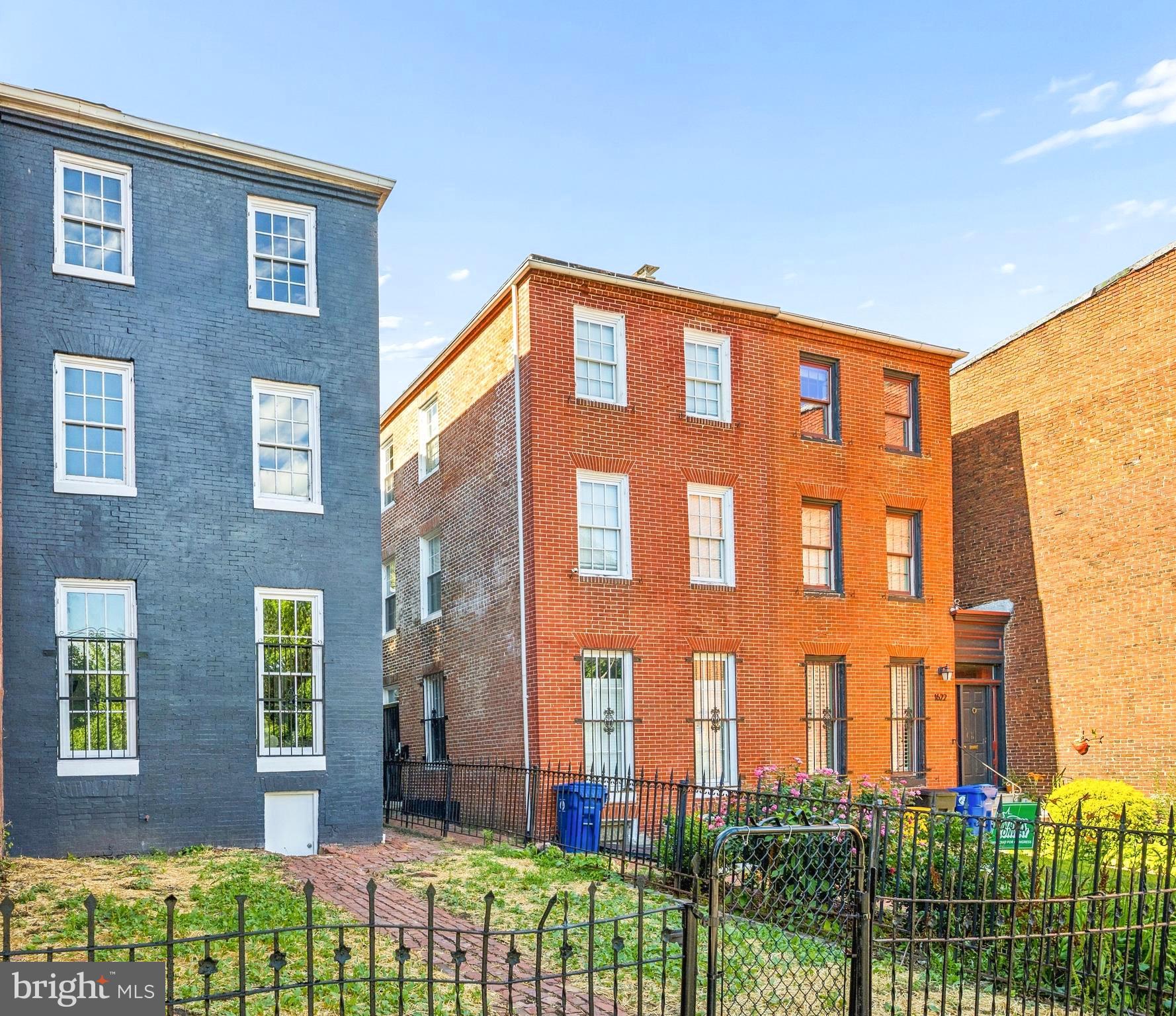 Welcome to 1626 Hollins Street, a beautifully renovated historic rowhome offering three finished levels of stylish living in the heart of Baltimore. Thoughtfully updated while preserving its classic charm, this home features a spacious, open floor plan designed for today's lifestyle.

The main level boasts a large living room with luxury LVP flooring, a convenient powder room, and an expansive gourmet kitchen complete with white shaker cabinetry, quartz countertops, a designer tile backsplash, stainless steel appliances, and a large center island with seating, plus a generous dining area perfect for entertaining.

The second floor features a spacious primary suite with a private bath showcasing a timeless black-and-white design. Also on this level are a full hall bathroom, a conveniently located laundry center, and an additional walk-through bedroom that leads to the third floor.

The third level offers two additional bedrooms, including a second en-suite with its own private bath, providing an ideal setup for guests, multigenerational living, or a private home office. An unfinished basement provides abundant storage space and room for hobbies or future customization.

Ideally situated in Baltimore's historic Union Square area, the home is just blocks from the beautifully restored Union Square Park, known for its tree-lined streets, historic architecture, community events, and one of the city's largest green spaces. Enjoy convenient access to downtown Baltimore, the University of Maryland Medical Center, Camden Yards, M&T Bank Stadium, the Inner Harbor, and major commuter routes including I-95 and I-295.

This location may also qualify eligible buyers for several homeownership assistance programs, including the Live Near Your Work Program for employees of participating institutions, the Baltimore City First-Time Homebuyer Incentive Program, and other Maryland Mortgage Program down payment and closing cost assistance options. Buyers should verify eligibility and current funding availability with their lender or housing counselor.

A rare opportunity to own a move-in-ready historic home with modern finishes, generous living space, and excellent access to everything Baltimore has to offer. Come see all that 1626 Hollins Street has to offer.